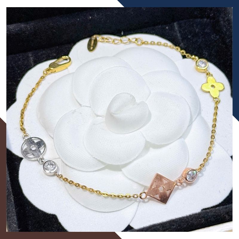 Lắc Tay Vàng Nữ 10K LTVN358 Mix Charm Cá Heo, Cỏ 4 Lá & Bi Vàng 3 Màu