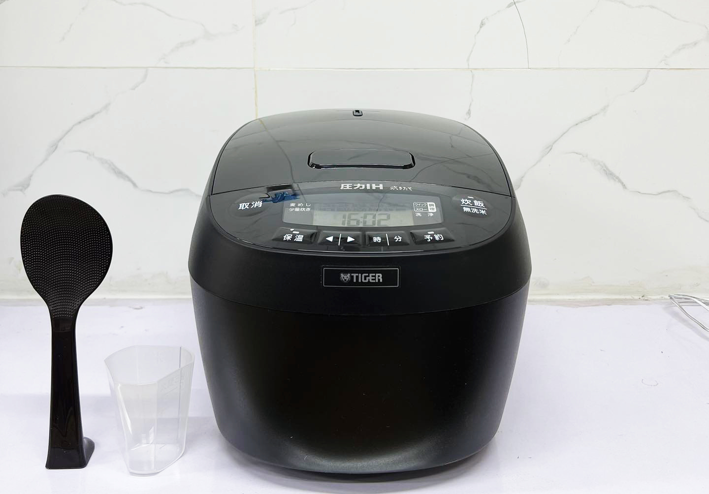 huong dan su dung noi com dien tiger noi dia nhat