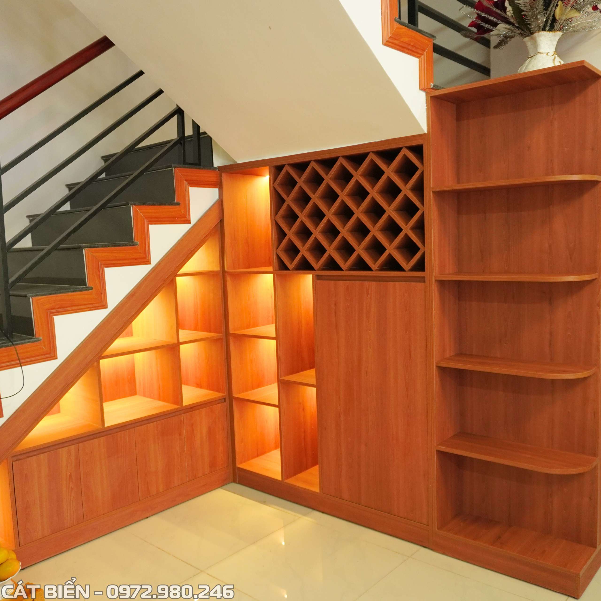 tủ ruou cầu thang tại khu do thi tay bac rach gia kien giang xuong san xuat noi that go cong nghiep cat bien