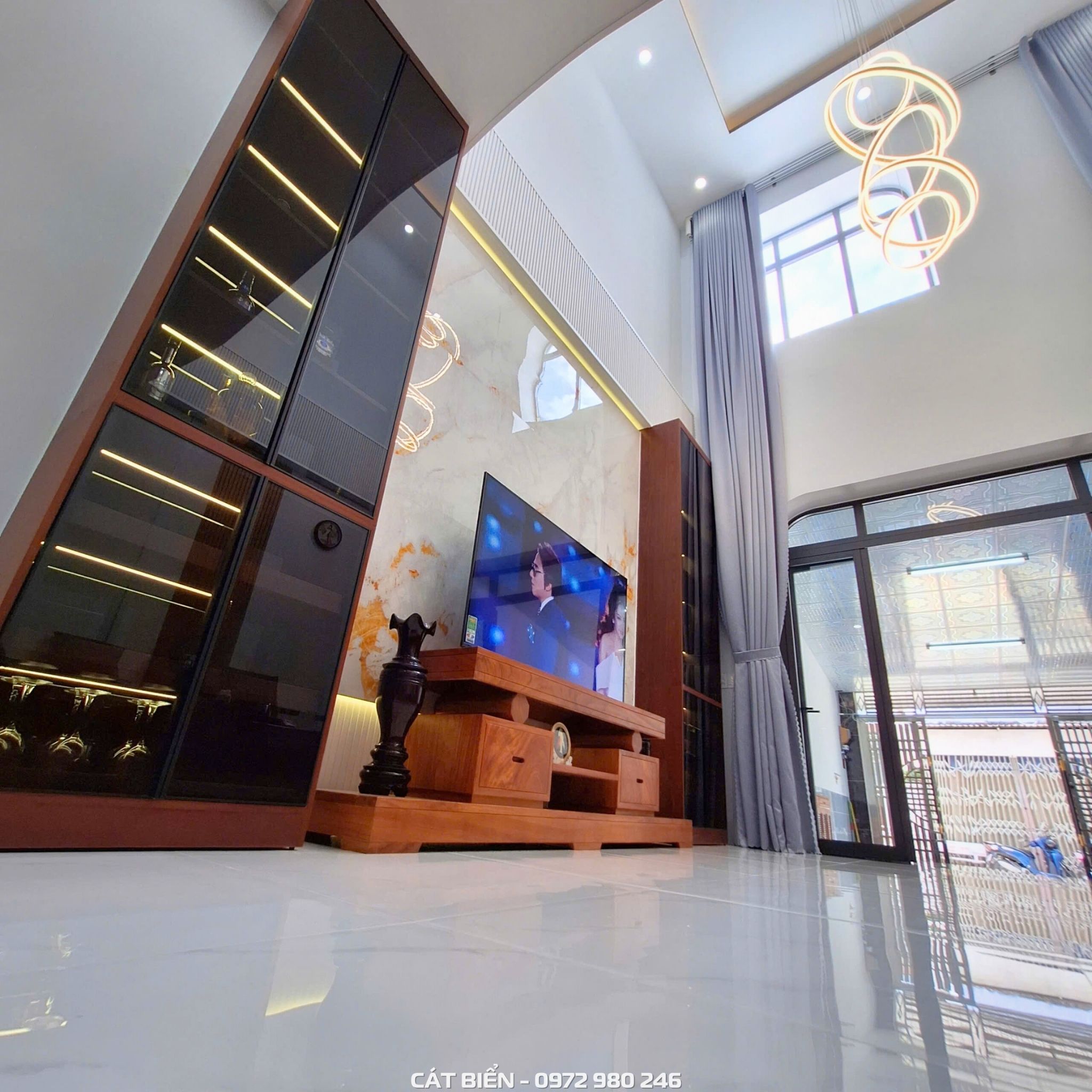 xưởng thiết kế sản xuất thi công lắp đặt vách trang trí, tủ rượu, tủ trang trí pvc vân đá, tủ cầu thang, lam sóng rạch giá kiên giang