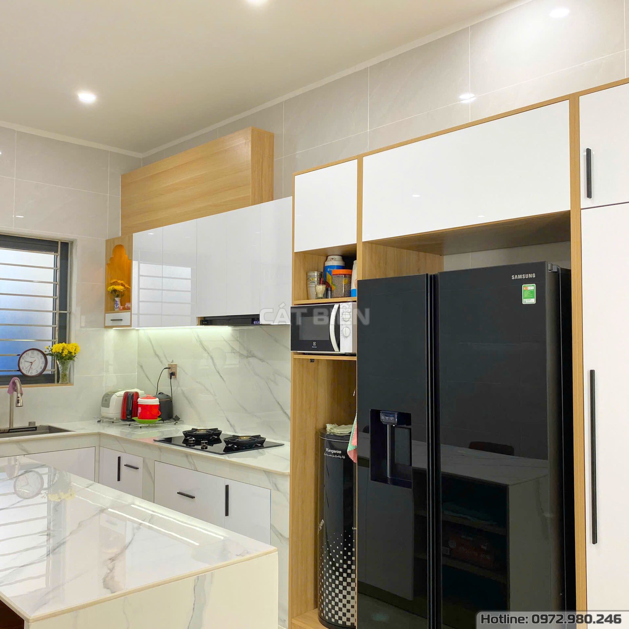 xưởng thiết kế sản xuất thi công lắp đặt tủ bếp, khung bao tủ lạnh, bếp âm, máy hút khói, bàn đảo, bàn ăn gỗ công nghiệp rạch giá kiên giang