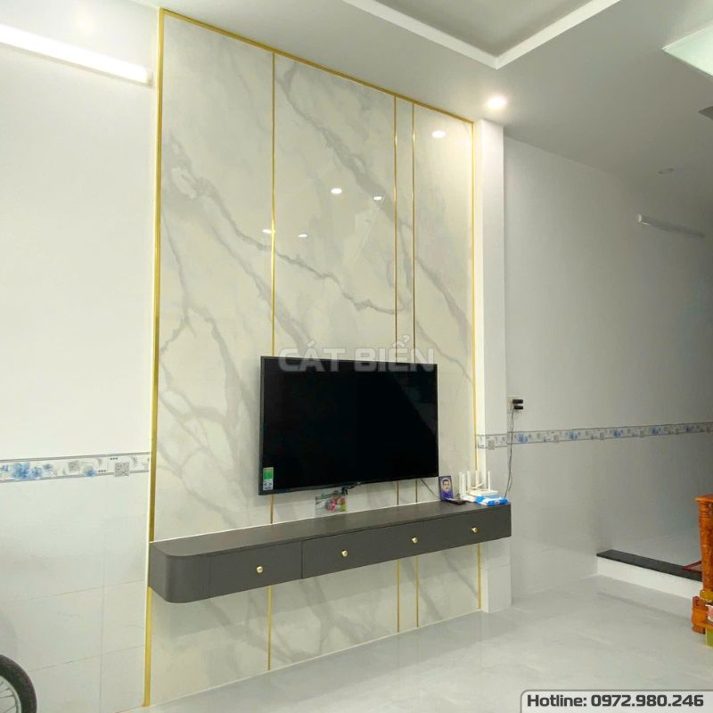 xưởng thiết kế sản xuất thi công lắp đặt kệ tivi, vách trang trí tranh tráng gương pvc vân đá, tủ cầu thang gỗ công nghiệp rạch giá kiên giang