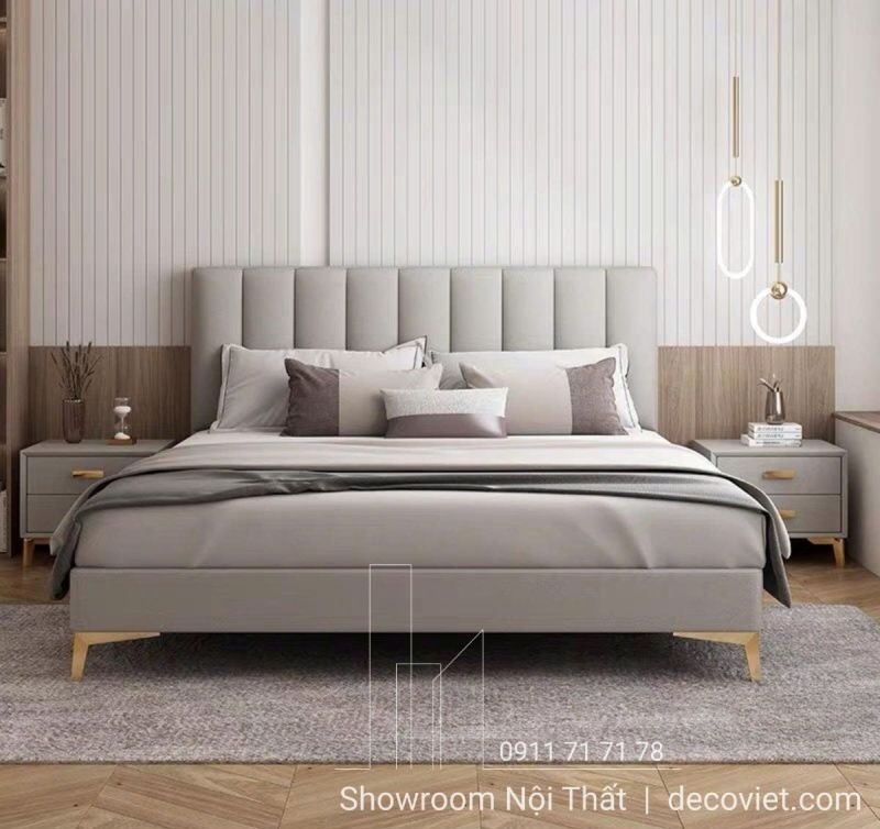 Giường khung thấp giúp căn phòng trông rộng và hiện đại hơn, mang phong cách tối giản sang trọng.