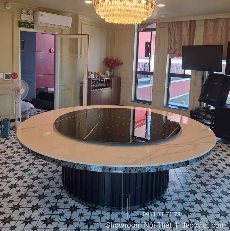 bàn ăn tròn mâm xoay lớn mặt đá sáng bóng