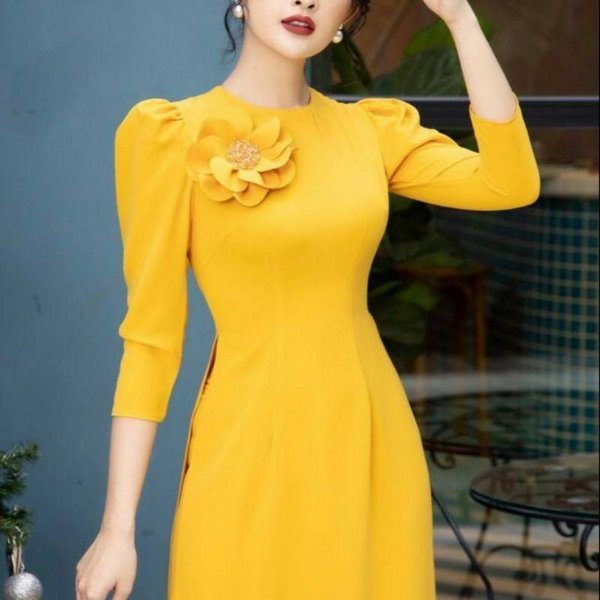 Áo dài tay phồng cổ tròn – Xu hướng mới của áo dài truyền thống