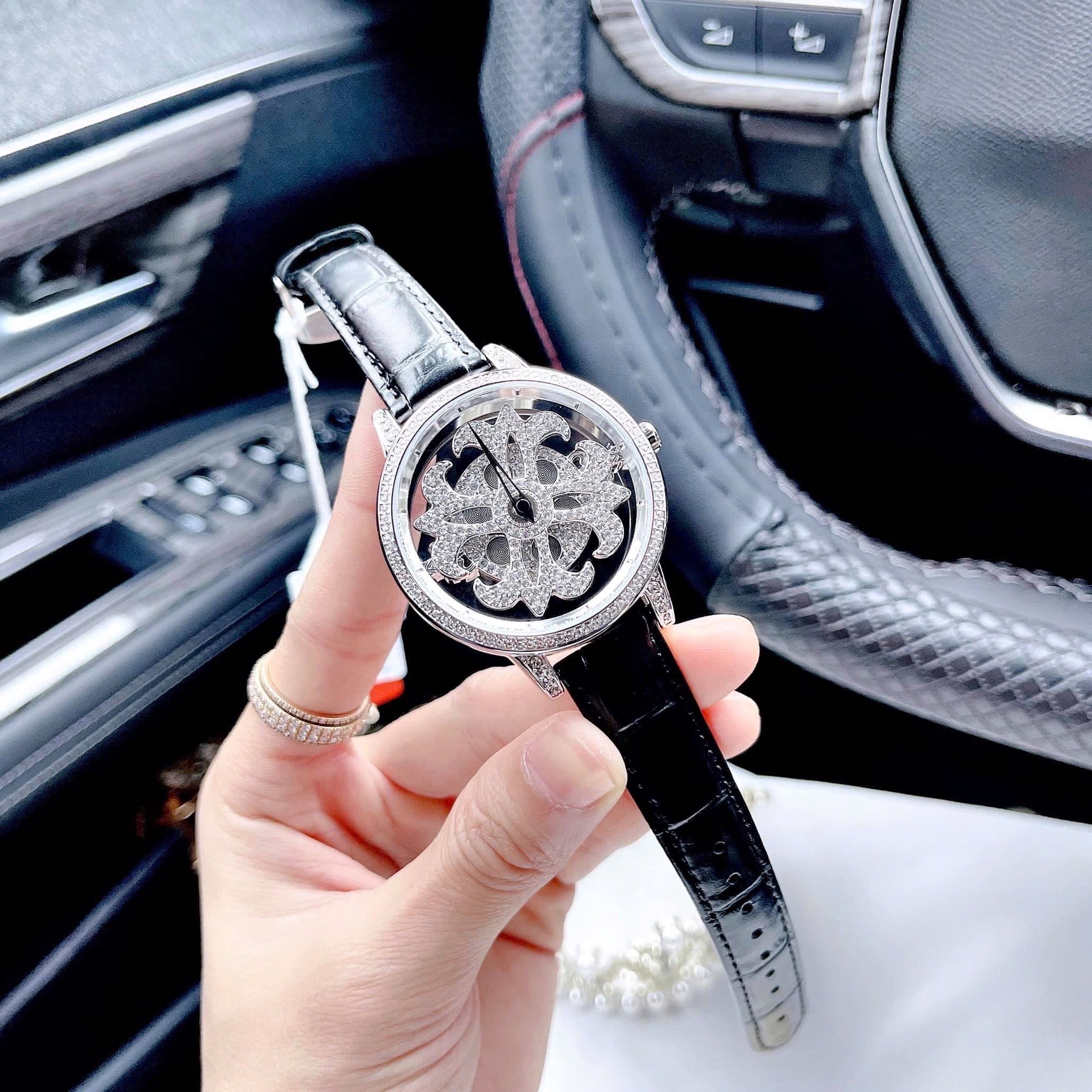 Đồng Hồ Davena Bông Hoa Xoay |Nữ Giới |Đính Đá Silver |Dây Da Đen |Máy Pin (Quartz) |Size 39mm |donghogiatot.vn