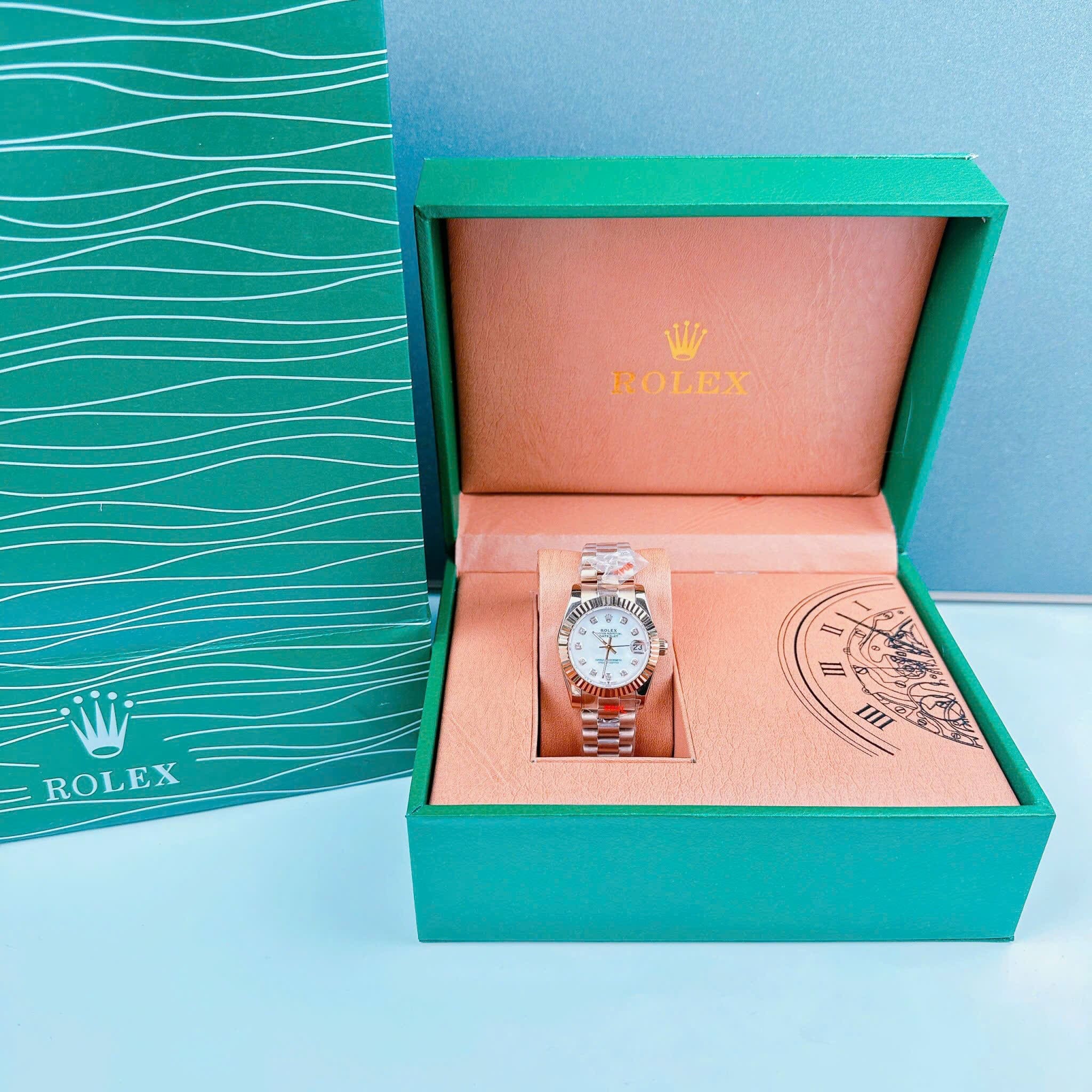 Đồng Hồ Rolex Niềng Khía |Cặp Đôi |Mặt Trắng |Dây Kim Loại Rose Gold |Máy Pin (Máy Quartz) |Size 36x31mm |donghogiatot.vn