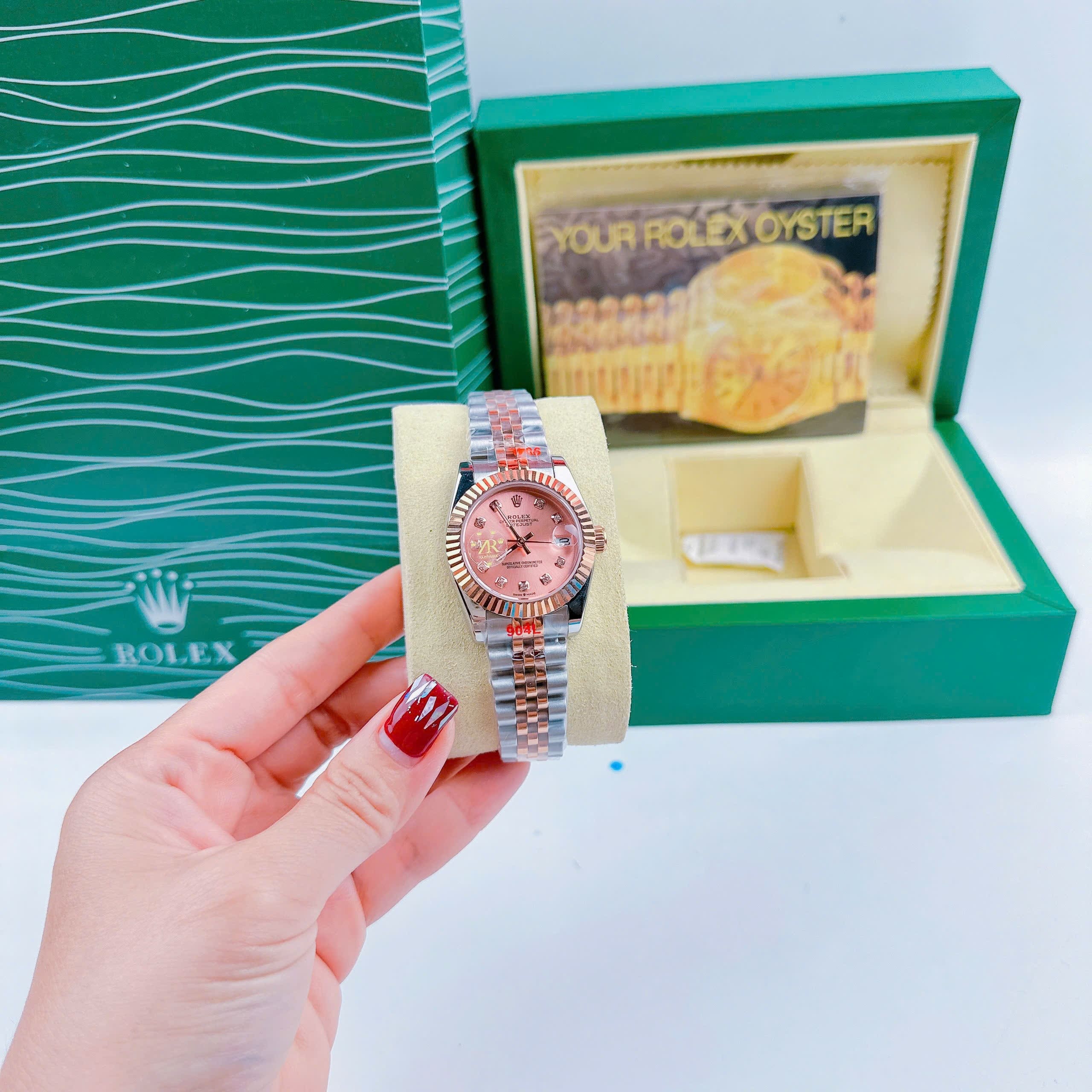 Đồng Hồ Rolex Niềng Khía |Nữ Giới |Mặt Hồng |Dây Kim Loại Demi Rose Gold |Máy Pin (Máy Quartz) |Size 31mm |donghogiatot.vn