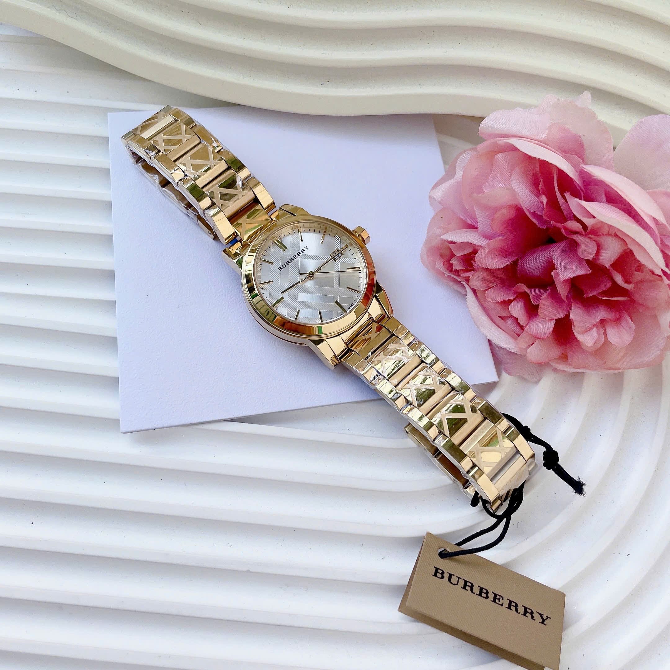 Đồng Hồ Burberry The City |Nữ Giới |Mặt Trắng |Dây Kim Loại Vàng Gold |Máy Pin (Quartz) |Size 34mm |donghogiatot.vn