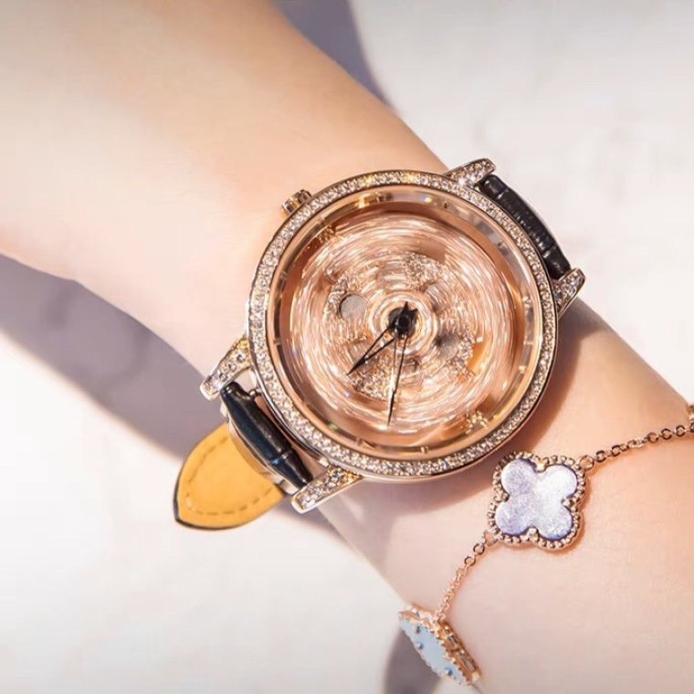 Đồng Hồ Davena Bông Hoa Xoay |Nữ Giới |Đính Đá Rose Gold |Dây Da Đen |Máy Pin (Quartz) |Size 39mm |donghogiatot.vn