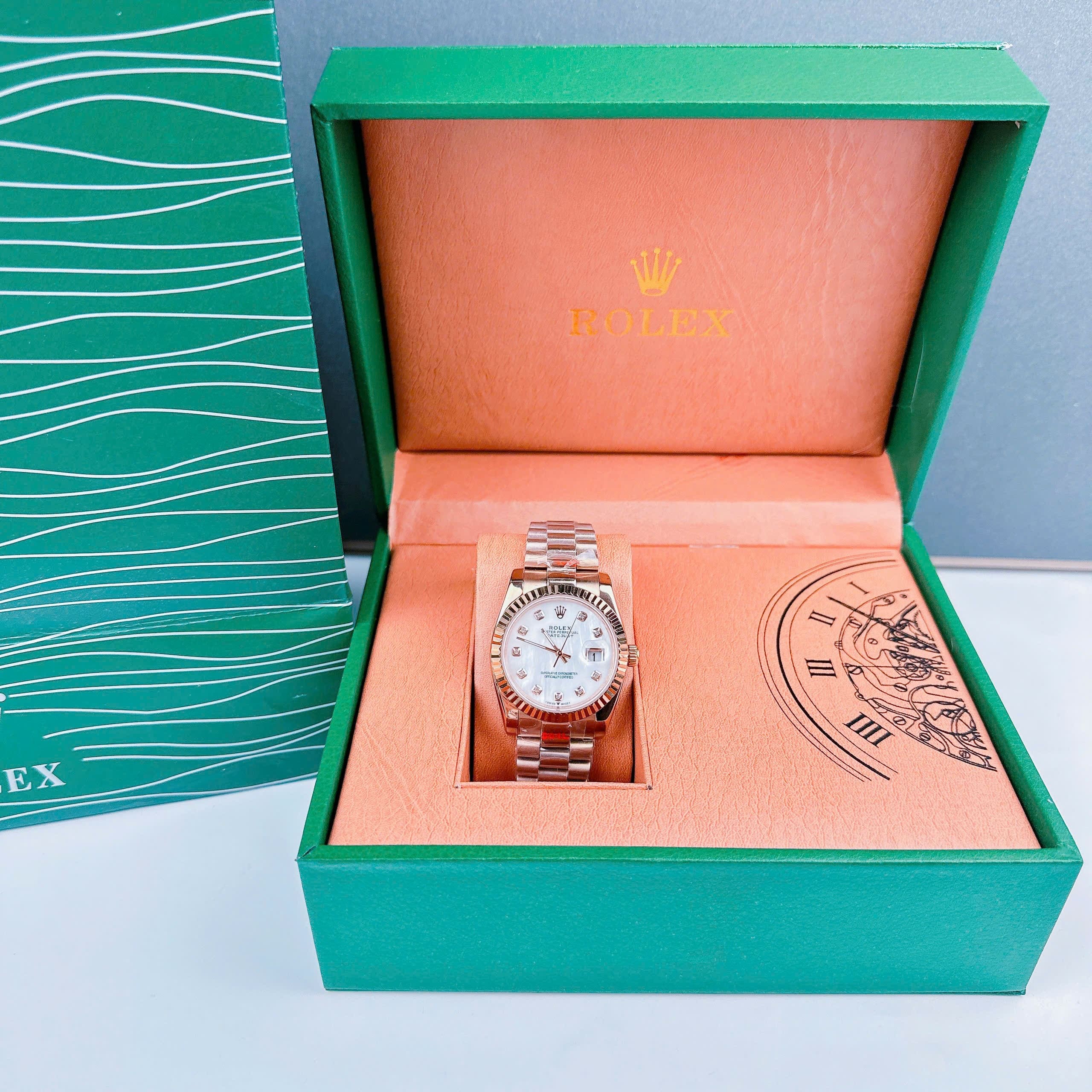 Đồng Hồ Rolex Niềng Khía |Cặp Đôi |Mặt Trắng |Dây Kim Loại Rose Gold |Máy Pin (Máy Quartz) |Size 36x31mm |donghogiatot.vn