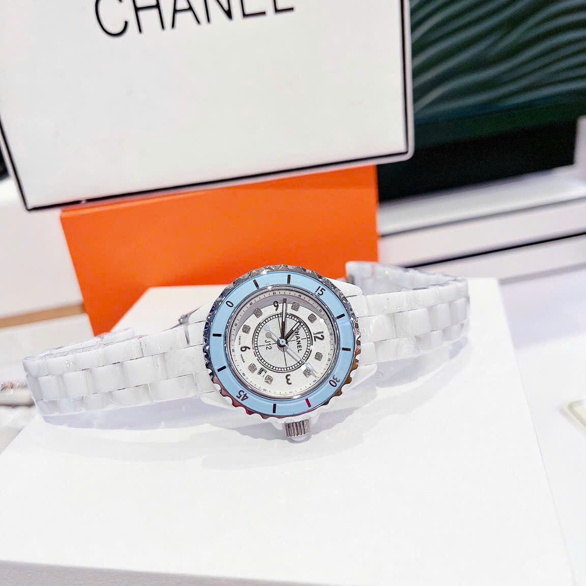 Đồng Hồ Chanel Hoa J12 |Nữ Giới |Niềng Xanh |Dây Đá Ceramica Trắng |Máy Pin (Quartz) |Size 34mm |donghogiatot.vn