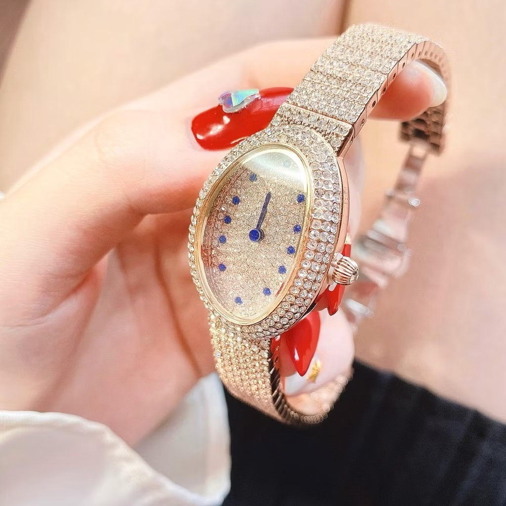 Đồng Hồ Davena Mặt Oval |Nữ Giới |Đính Đá Xanh |Vòng Tay Rose Gold |Máy Pin (Quartz) |Size 28mm |donghogiatot.vn