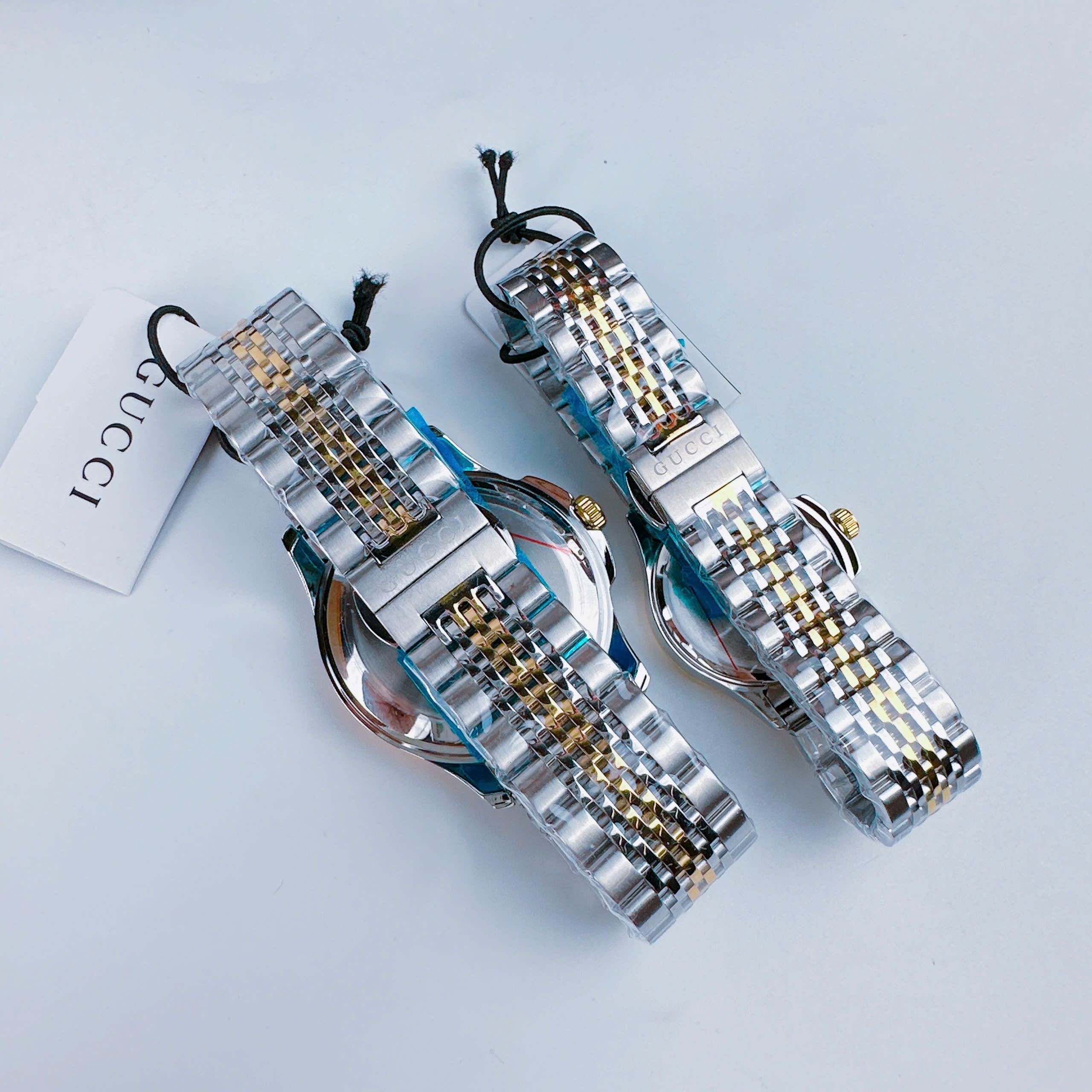 Đồng Hồ Gucci G-Timeless |Cặp Đôi |Mặt Màu Trắng |Dây Kim Loại Demi Vàng Gold |Size 38x28mm |donghogiatot.vn