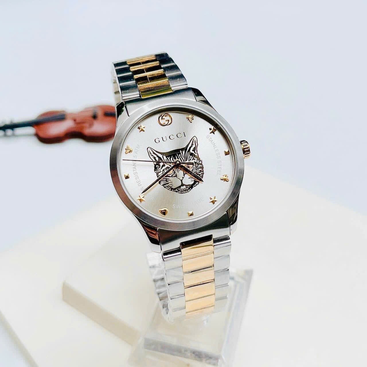 Đồng Hồ Gucci G-Timeless |Nam |Mặt Chú Mèo |Dây Kim Loại Demi Vàng Gold |Máy Pin (Quartz) |Size 38mm |donghogiatot.vn