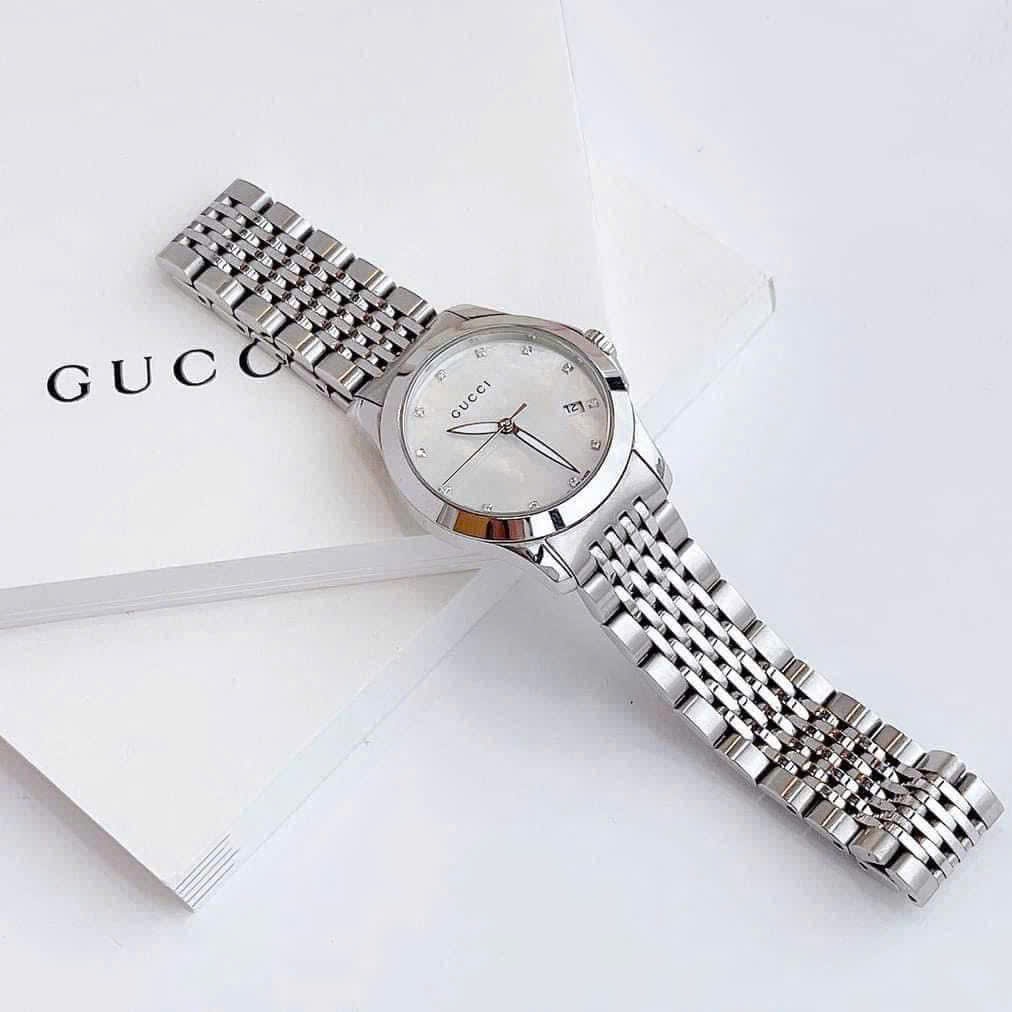 Đồng Hồ Gucci G-Timeless |Nữ |Mặt Xà Cừ Trắng |Dây Kim Loại Silver |Máy Pin (Quartz) |Size 29mm |donghogiatot.vn