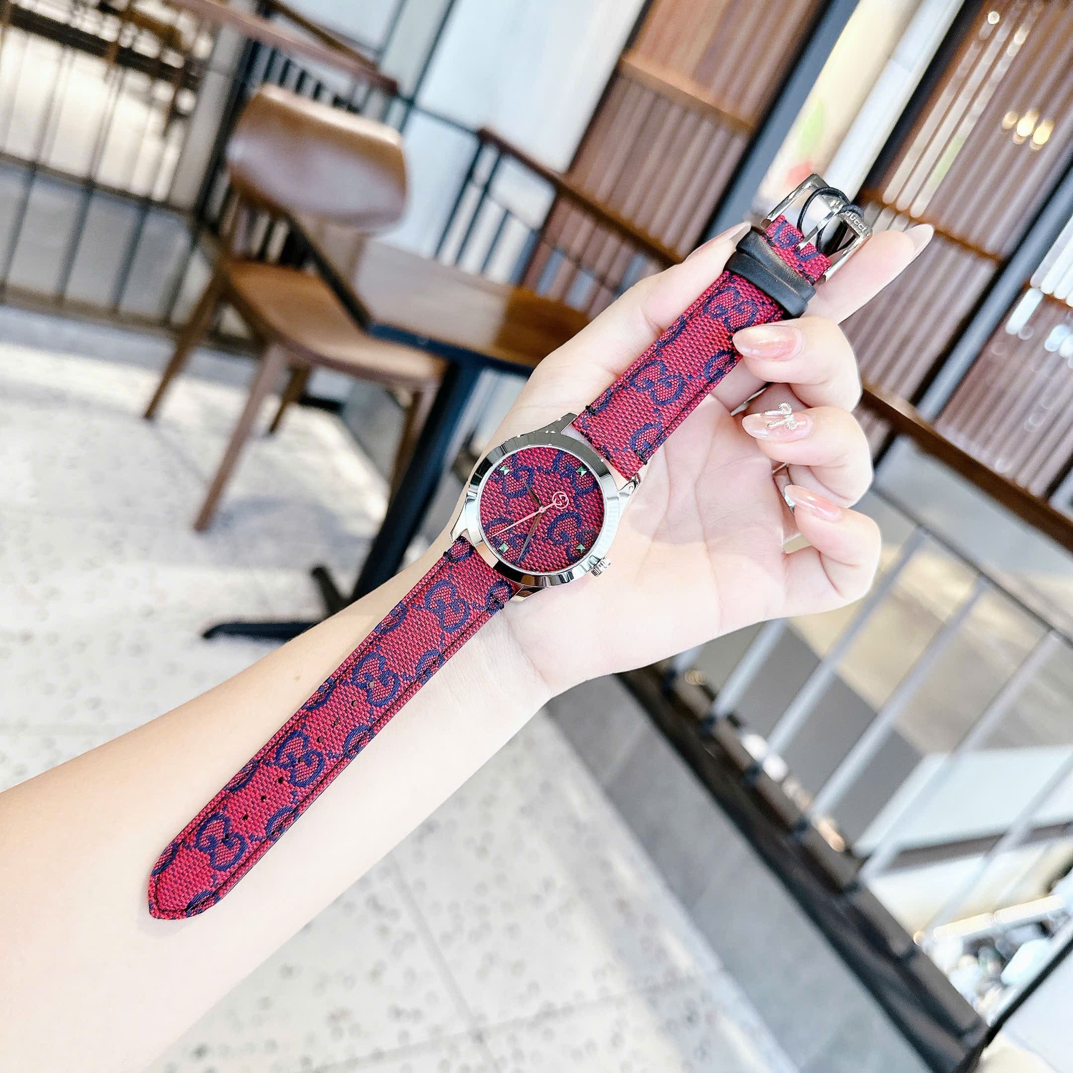 Đồng Hồ Gucci Multicolor G-Timeless |Nữ Giới |Mặt Tròn |Dây Vải Bọc Da Đỏ |Máy Pin (Quartz) |Size 38mm |donghogiatot.vn