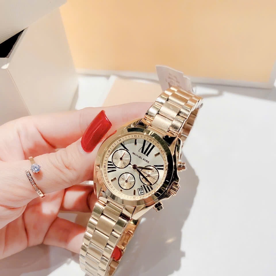 Đồng Hồ Michael Kors Bradshaw |Cặp Đôi |Mặt Tròn |Dây Kim Loại Vàng Gold |Máy Pin (Quartz) |Size 42x36mm |donghogiatot.vn