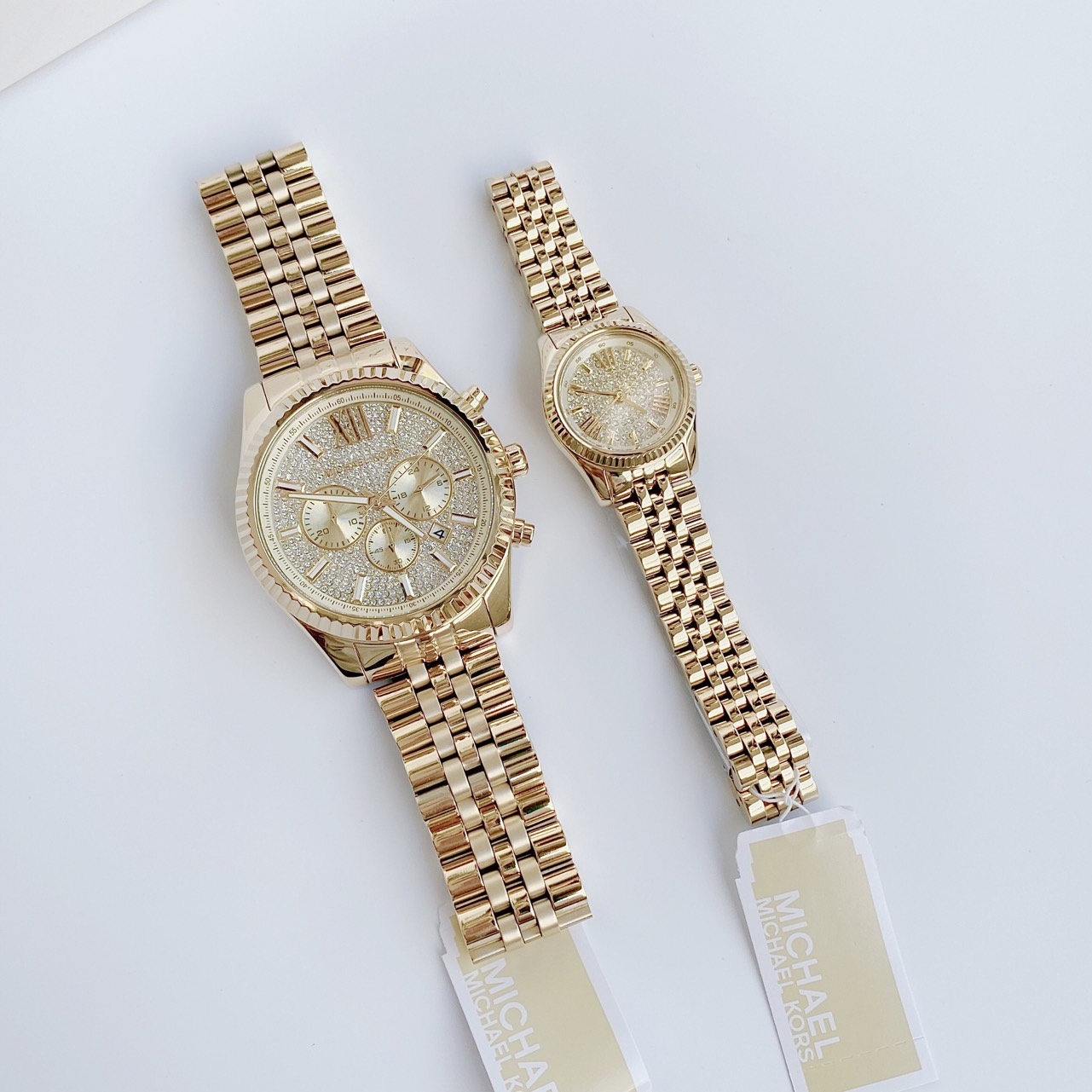 Đồng Hồ Michael Kors Lexington |Cặp Đôi |Mặt Full Đá |Dây Kim Loại Vàng Gold |Máy Pin (Quartz) |Size 44x22mm |donghogiatot.vn