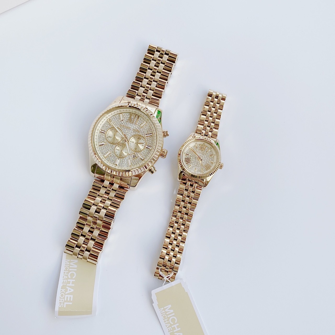 Đồng Hồ Michael Kors Lexington |Cặp Đôi |Mặt Full Đá |Dây Kim Loại Vàng Gold |Máy Pin (Quartz) |Size 44x22mm |donghogiatot.vn