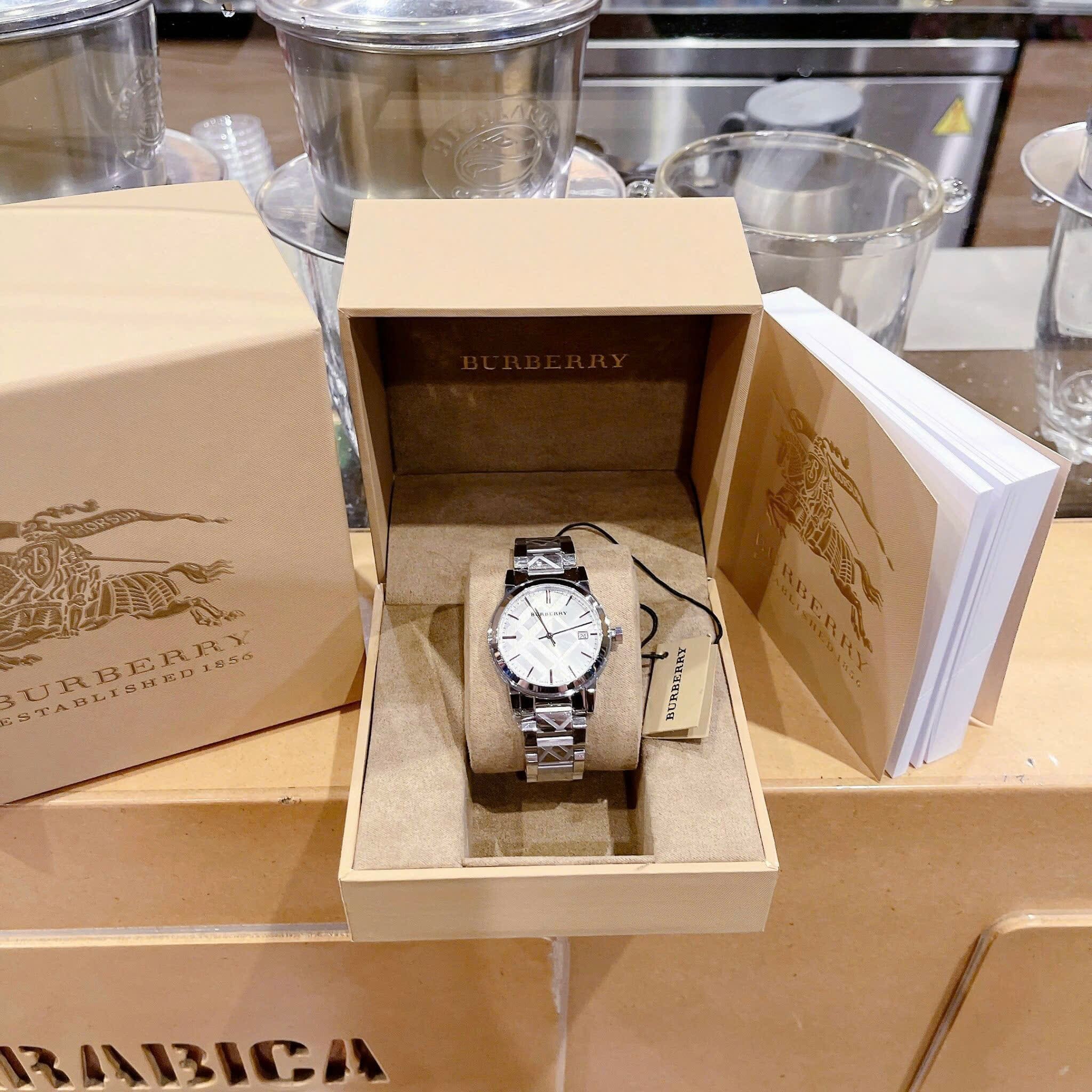 Đồng Hồ Burberry The City |Nữ Giới |Mặt Tròn |Dây Kim Loại Silver |Máy Pin (Quartz) |Size 34mm |donghogiatot.vn
