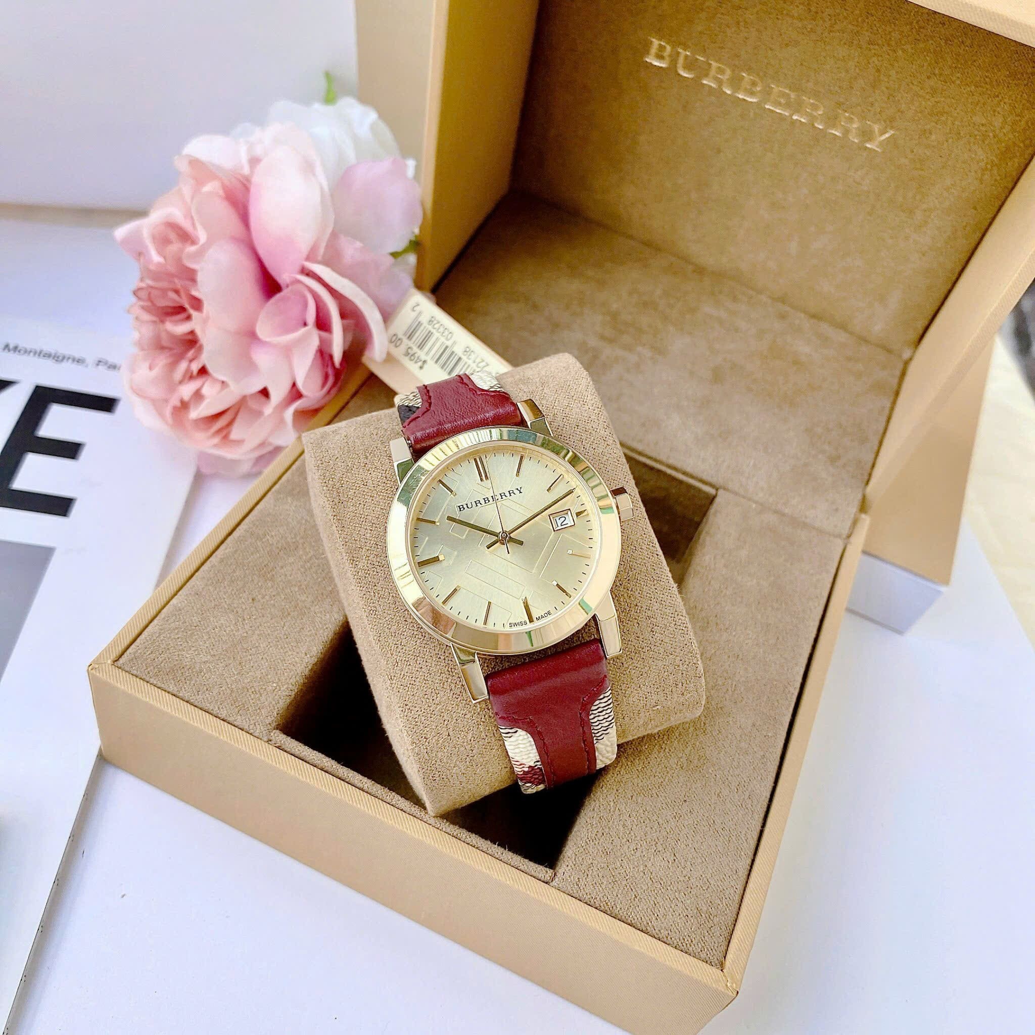 Đồng Hồ Burberry The City Haymarket |Nữ Giới |Vàng Gold |Dây Da Đỏ |Máy Pin (Quartz) |Size 34mm |donghogiatot.vn