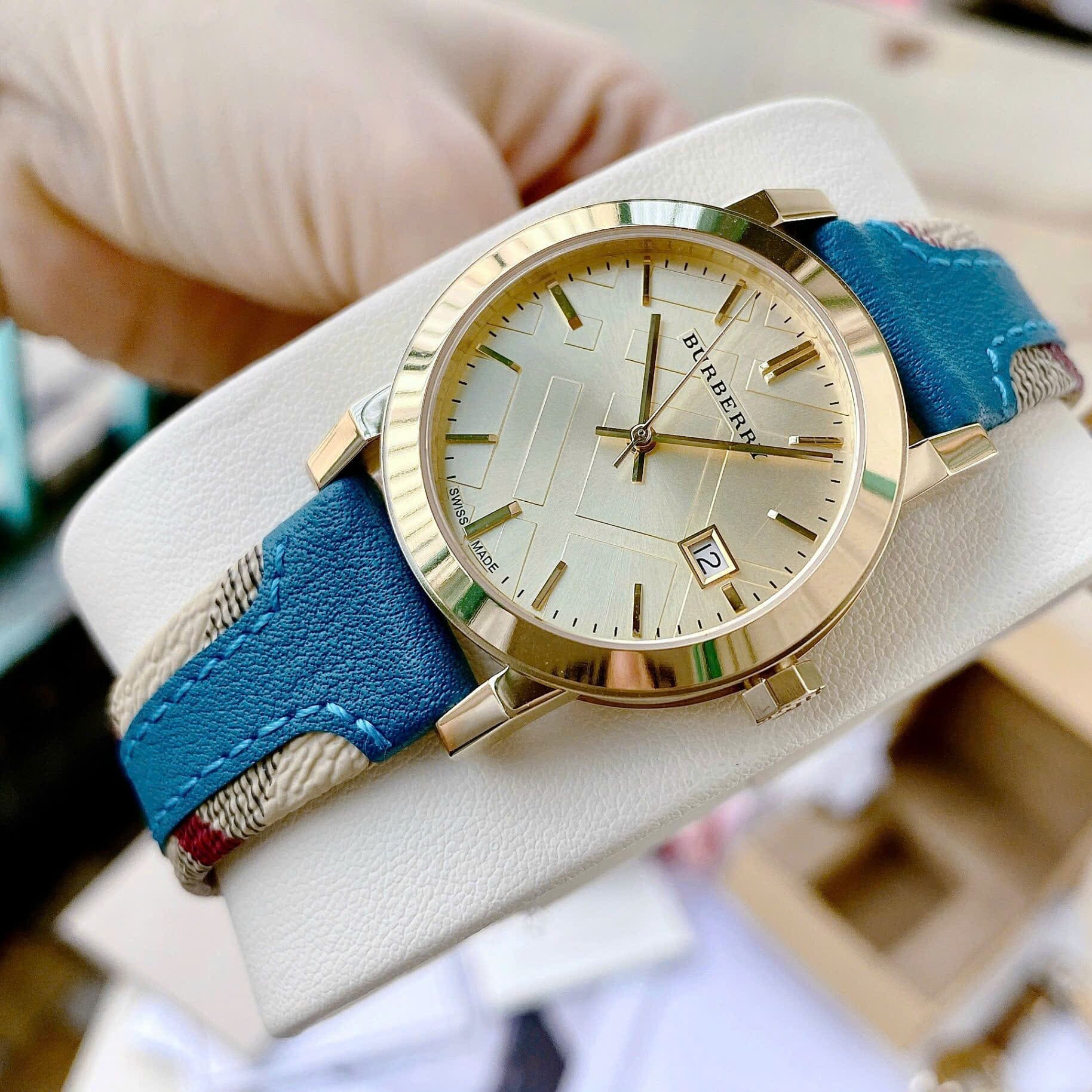 Đồng Hồ Burberry The City Haymarket |Nữ Giới |Vàng Gold |Dây Da Xanh Dương |Máy Pin (Quartz) |Size 34mm |donghogiatot.vn
