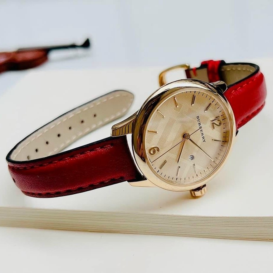 Đồng Hồ Burberry The Classic Round |Nữ Giới |Vàng Gold |Dây Da Đỏ |Máy Pin (Quartz) |Size 32mm |donghogiatot.vn