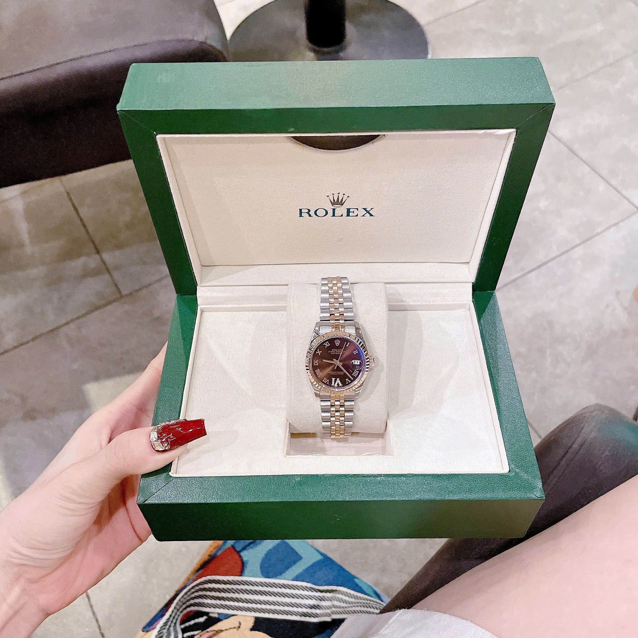 Đồng Hồ Rolex Mặt Số La Mã |Nữ Giới |Nâu |Niềng Khía |Dây Kim Loại Demi |Máy Pin (Máy Quartz) |Size 31mm |donghogiatot.vn