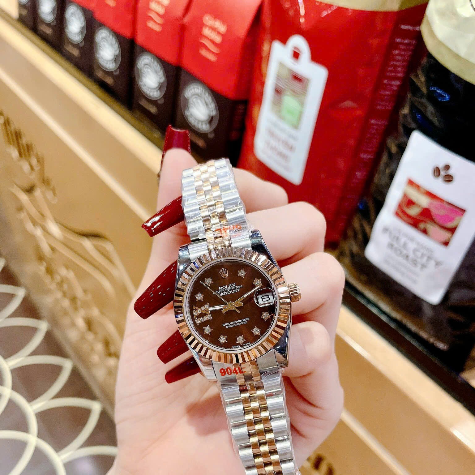 Đồng Hồ Rolex Niềng Khía |Nữ Giới |Mặt Nâu |Đính Đá Ngôi Sao |Dây Kim Loại Demi |Máy Pin (Máy Quartz) |Size 31mm |donghogiatot.vn