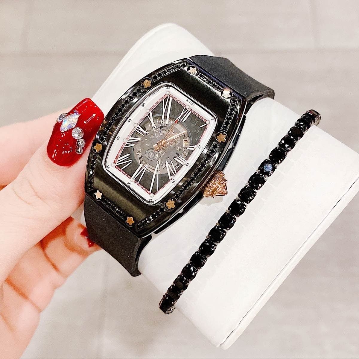Đồng Hồ Xcer Đính Đá Đen |Nữ Giới |Lộ Máy |Dây Cao Su Đen |Máy Tự Động (Automatic) |Size 36mm |donghogiatot.vn