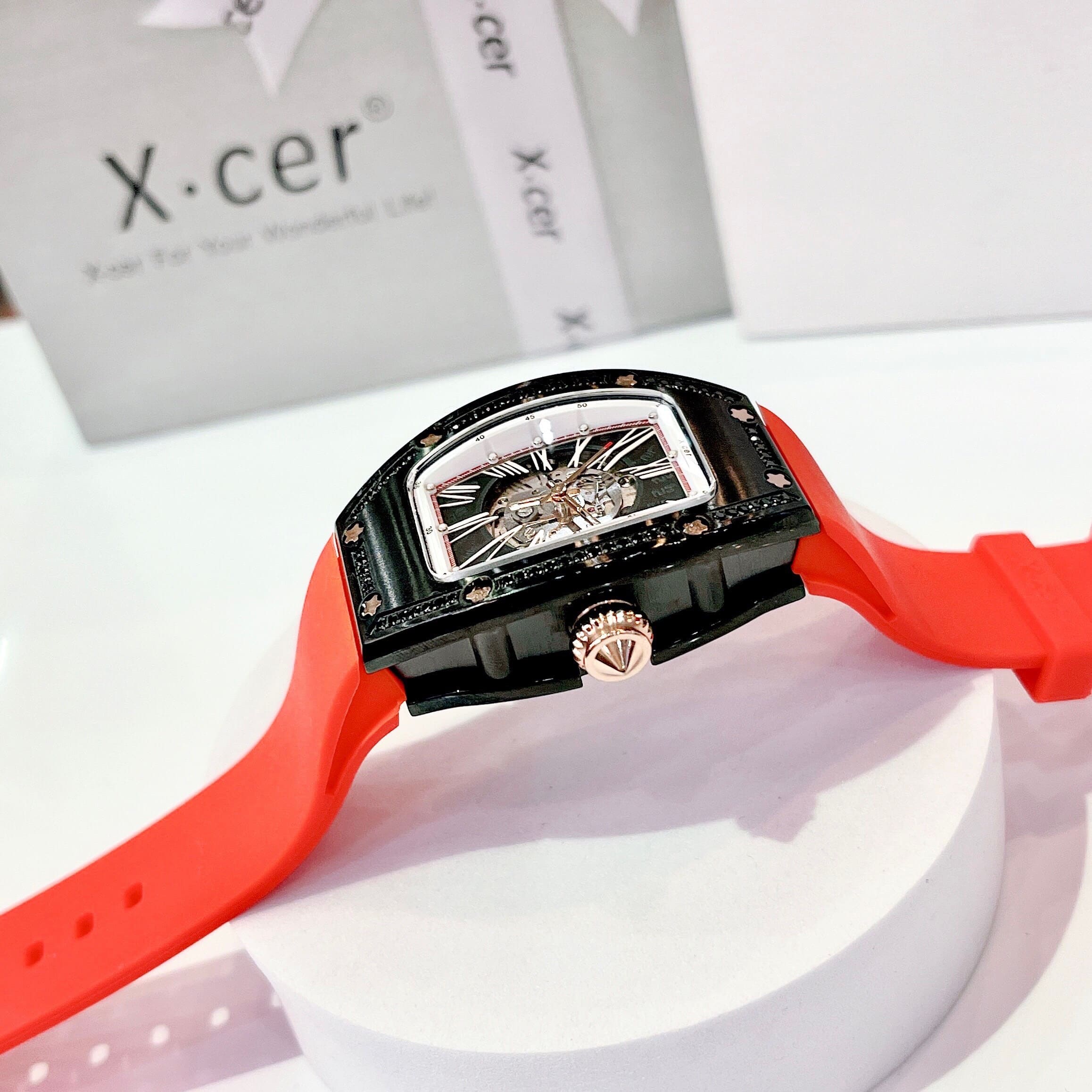 Đồng Hồ Xcer Đính Đá Đen |Nữ Giới |Mặt Oval |Lộ Máy |Dây Cao Su Đỏ |Máy Tự Động (Automatic) |Size 36mm |donghogiatot.vn