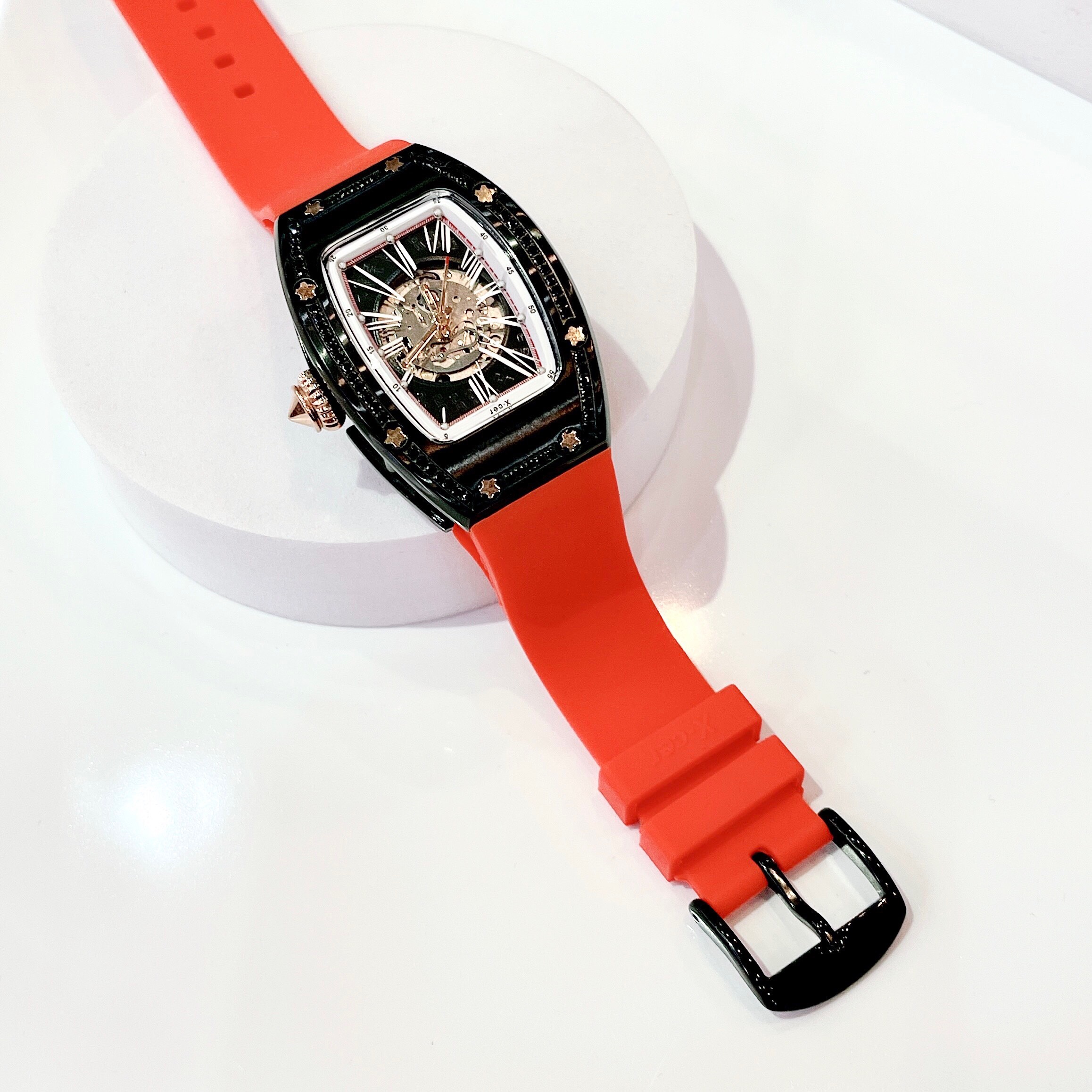 Đồng Hồ Xcer Đính Đá Đen |Nữ Giới |Mặt Oval |Lộ Máy |Dây Cao Su Đỏ |Máy Tự Động (Automatic) |Size 36mm |donghogiatot.vn