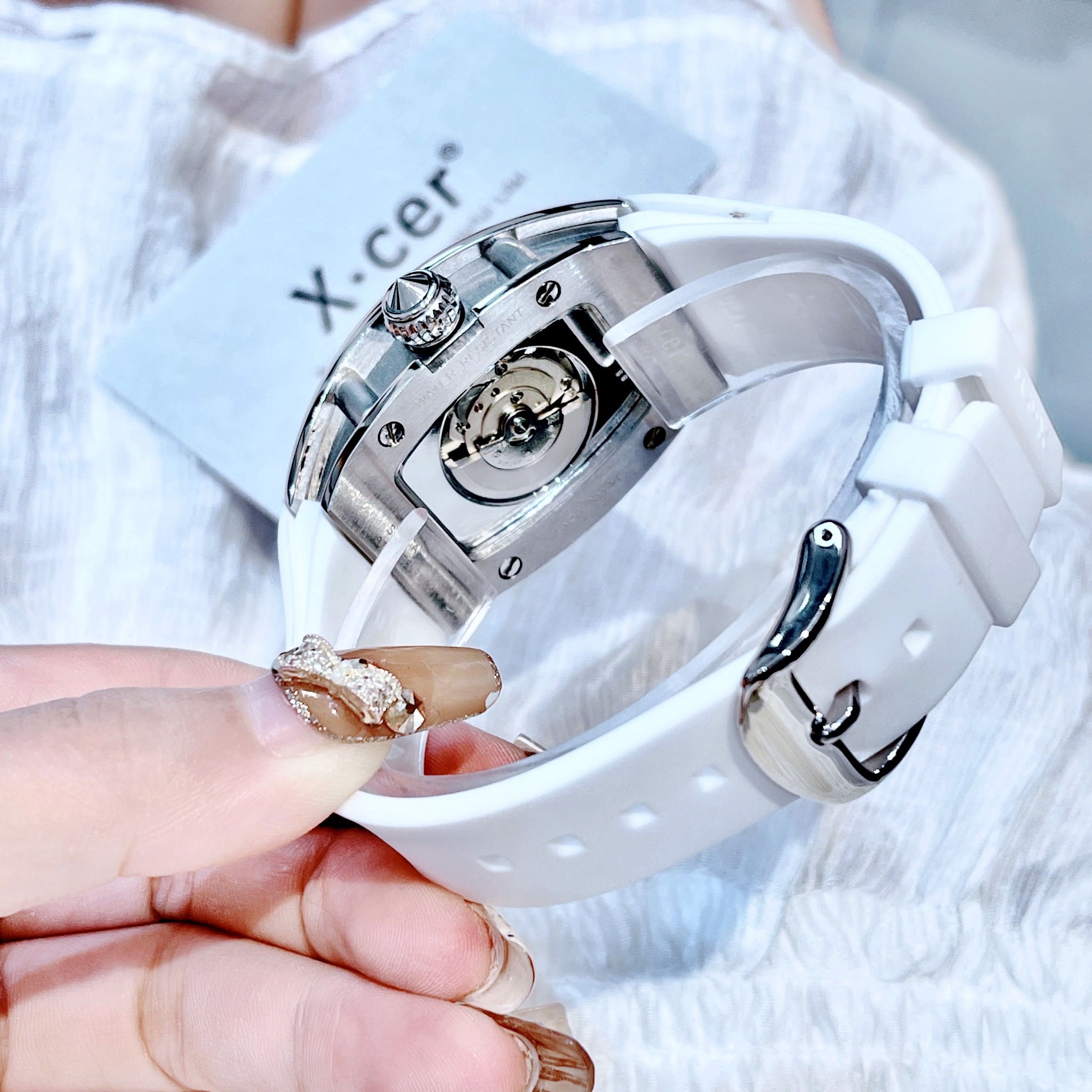 Đồng Hồ Xcer Lộ Cơ |Nữ Giới |Mặt Oval |Đính Đá |Silver |Dây Cao Su Trắng |Máy Tự Động (Automatic) |Size 36mm |donghogiatot.vn