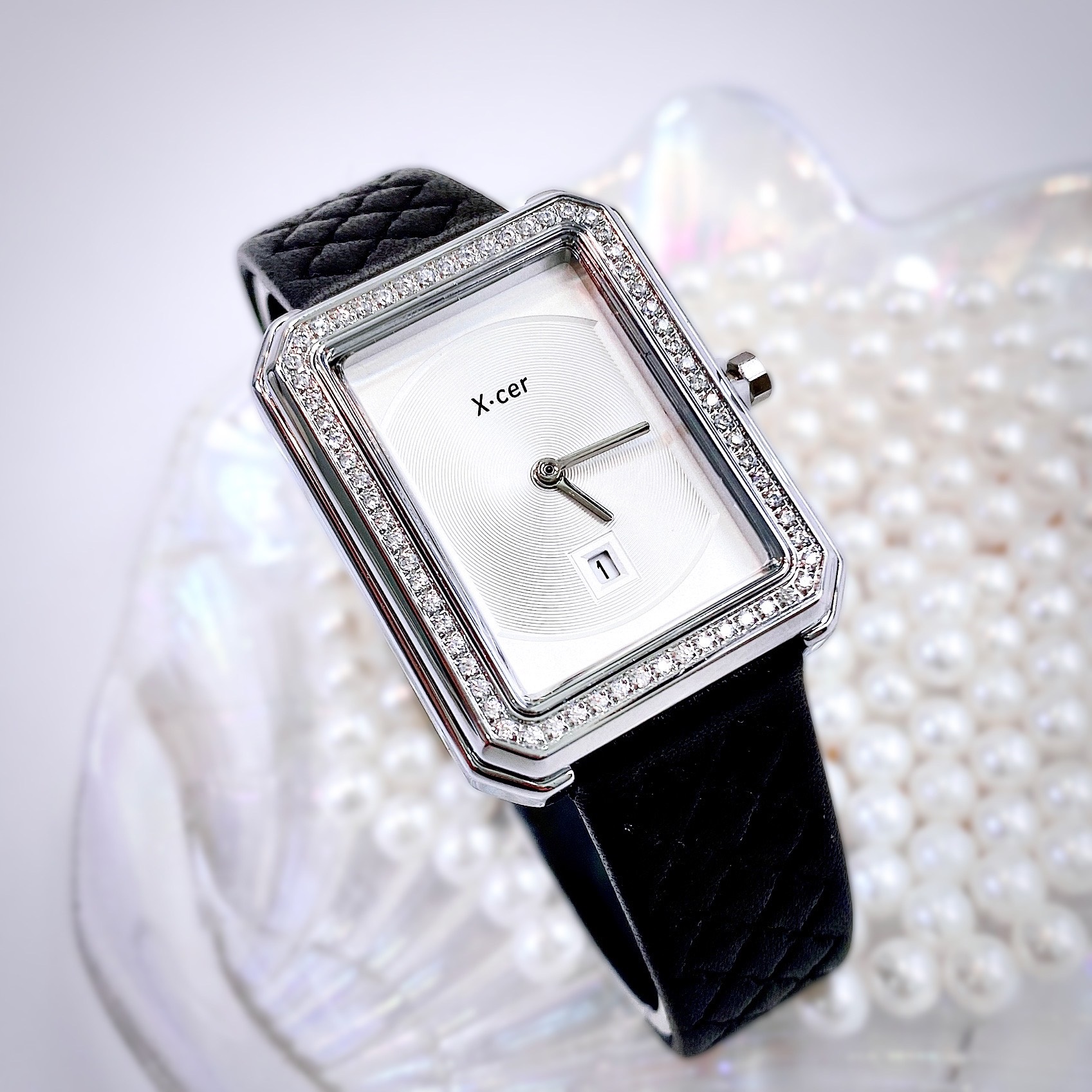 Đồng Hồ Xcer Mặt Chữ Nhật Trắng |Nữ Giới |Khảm Đá |Silver |Dây Trám Đen |Máy Pin (Quartz) |Size 28mm |donghogiatot.vn