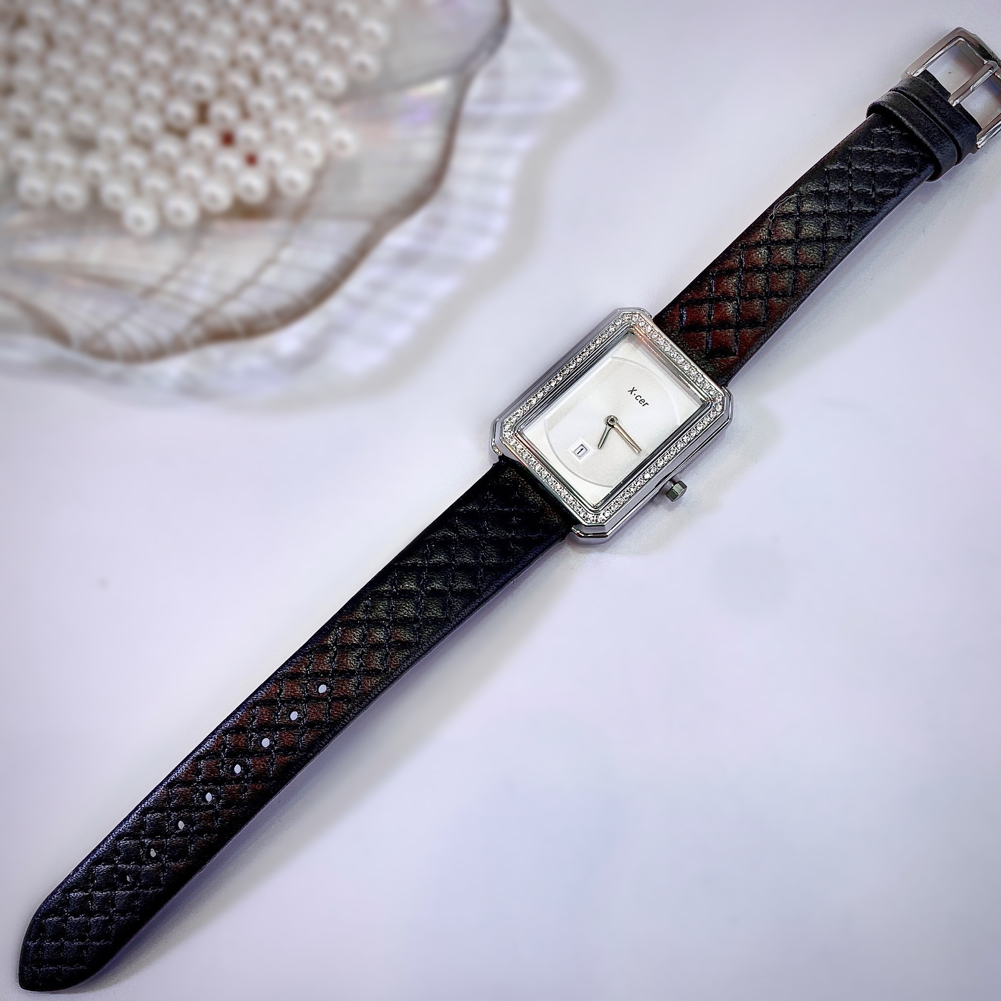 Đồng Hồ Xcer Mặt Chữ Nhật Trắng |Nữ Giới |Khảm Đá |Silver |Dây Trám Đen |Máy Pin (Quartz) |Size 28mm |donghogiatot.vn