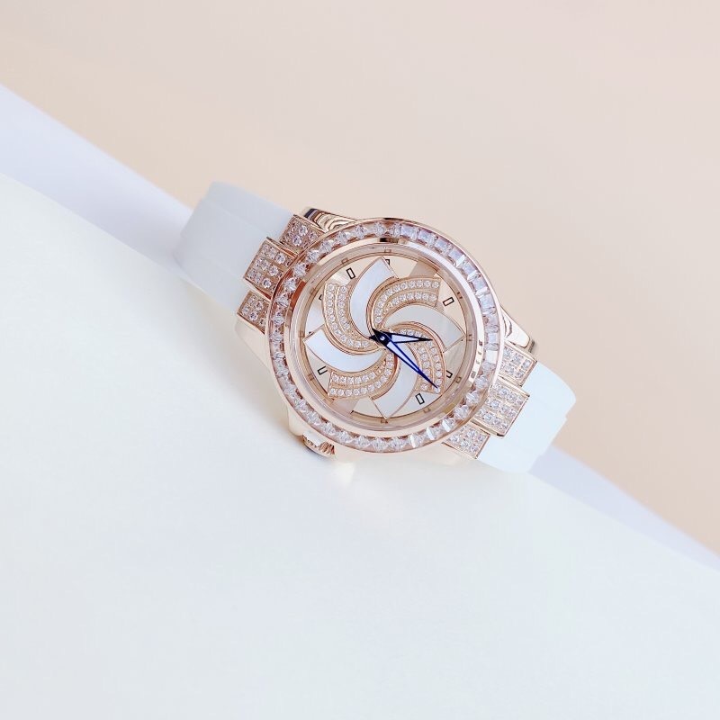 Đồng Hồ Xcer Mặt Xoay |Nữ Giới |Đính Đá |Rose Gold |Dây Cao Su Trắng |Máy Pin (Quartz) |Size 38mm |donghogiatot.vn