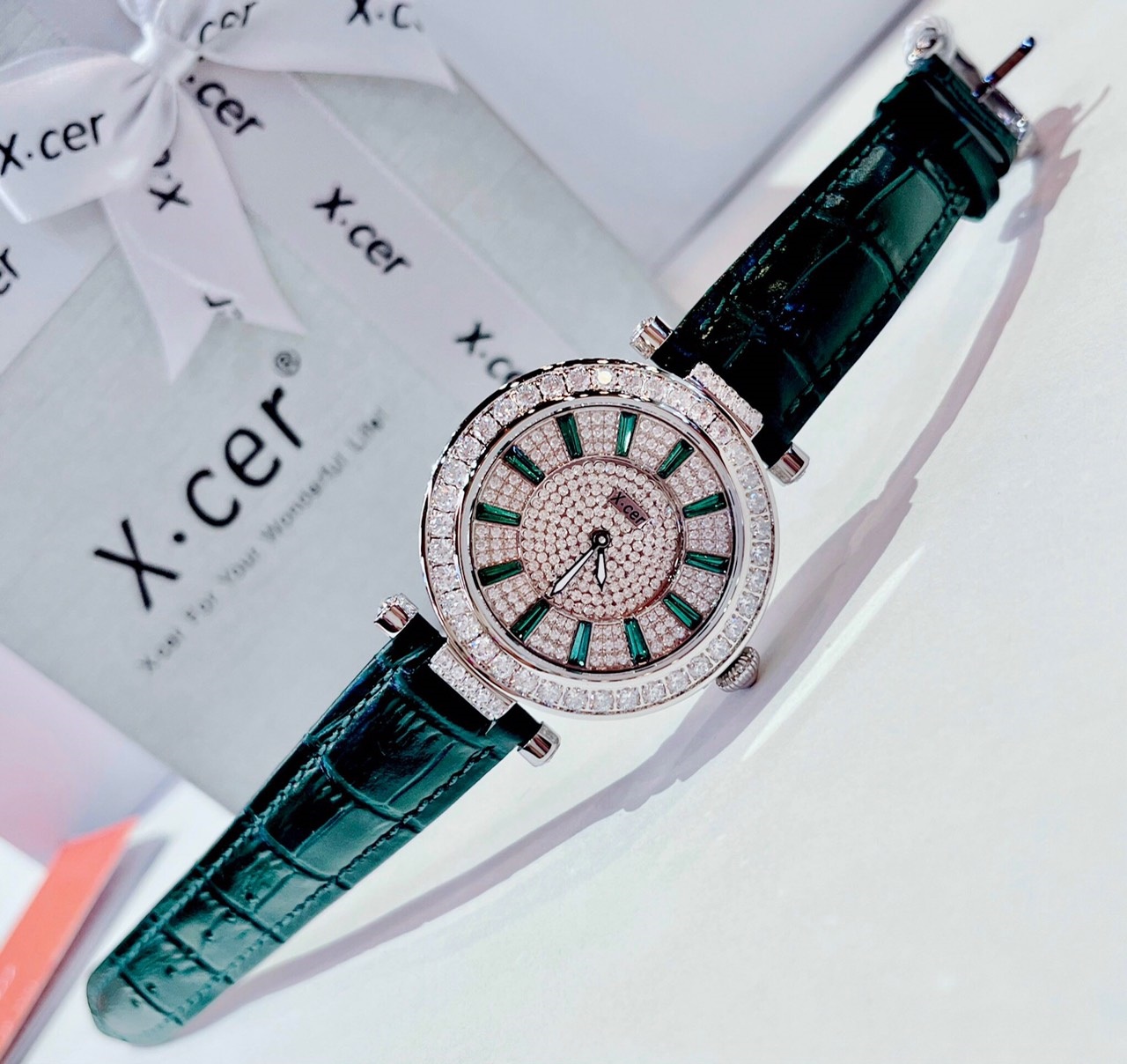 Đồng Hồ Xcer Ông Mặt Trời |Nữ Giới |Đính Full Đá |Silver |Dây Da Xanh Lá |Máy Pin (Quartz) |Size 38mm |donghogiatot.vn