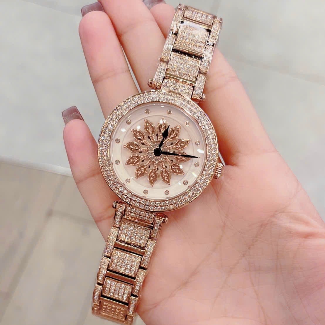 Đồng Hồ Davena Bông Hoa Xoay |Nữ Giới |Đính Đá |Dây Kim Loại Rose Gold |Máy Pin (Quartz) |Size 38mm |donghogiatot.vn