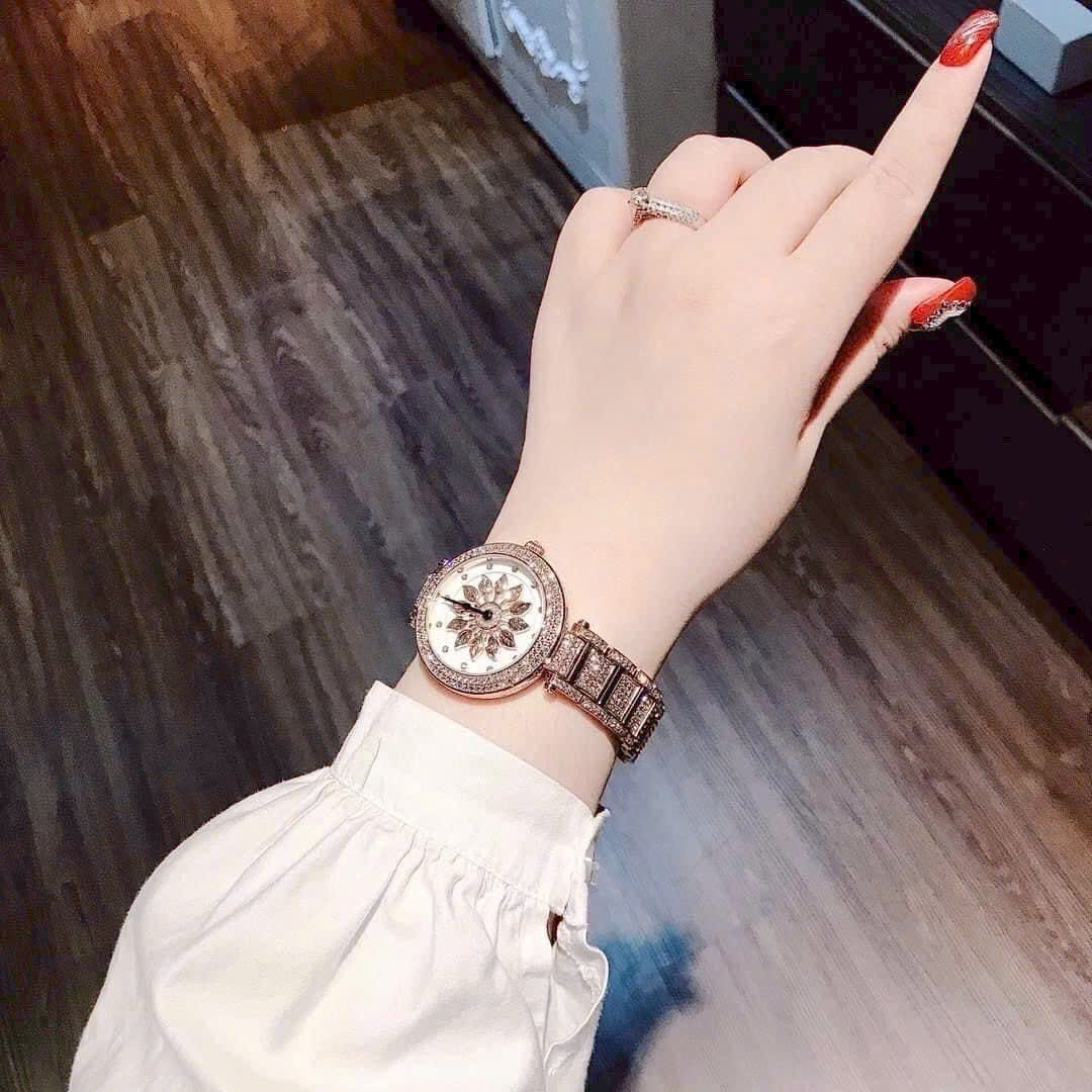 Đồng Hồ Davena Bông Hoa Xoay |Nữ Giới |Đính Đá |Dây Kim Loại Rose Gold |Máy Pin (Quartz) |Size 38mm |donghogiatot.vn