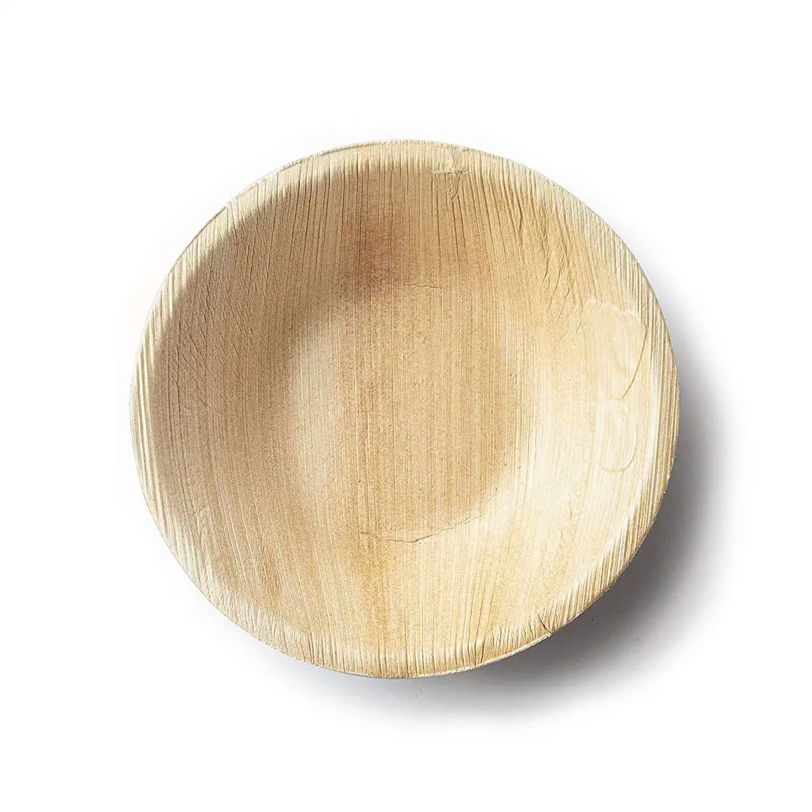 Stack of round areca leaf bowls – perfect for restaurants, catering, and events