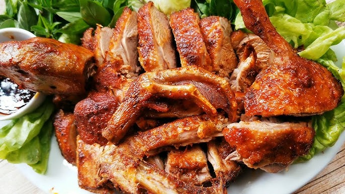 vịt nguyên con nướng mắc khén