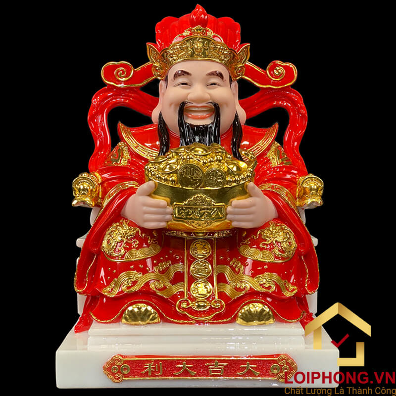 Tượng ông Thần Tài đá đỏ có viền vàng tượng trưng cho may mắn