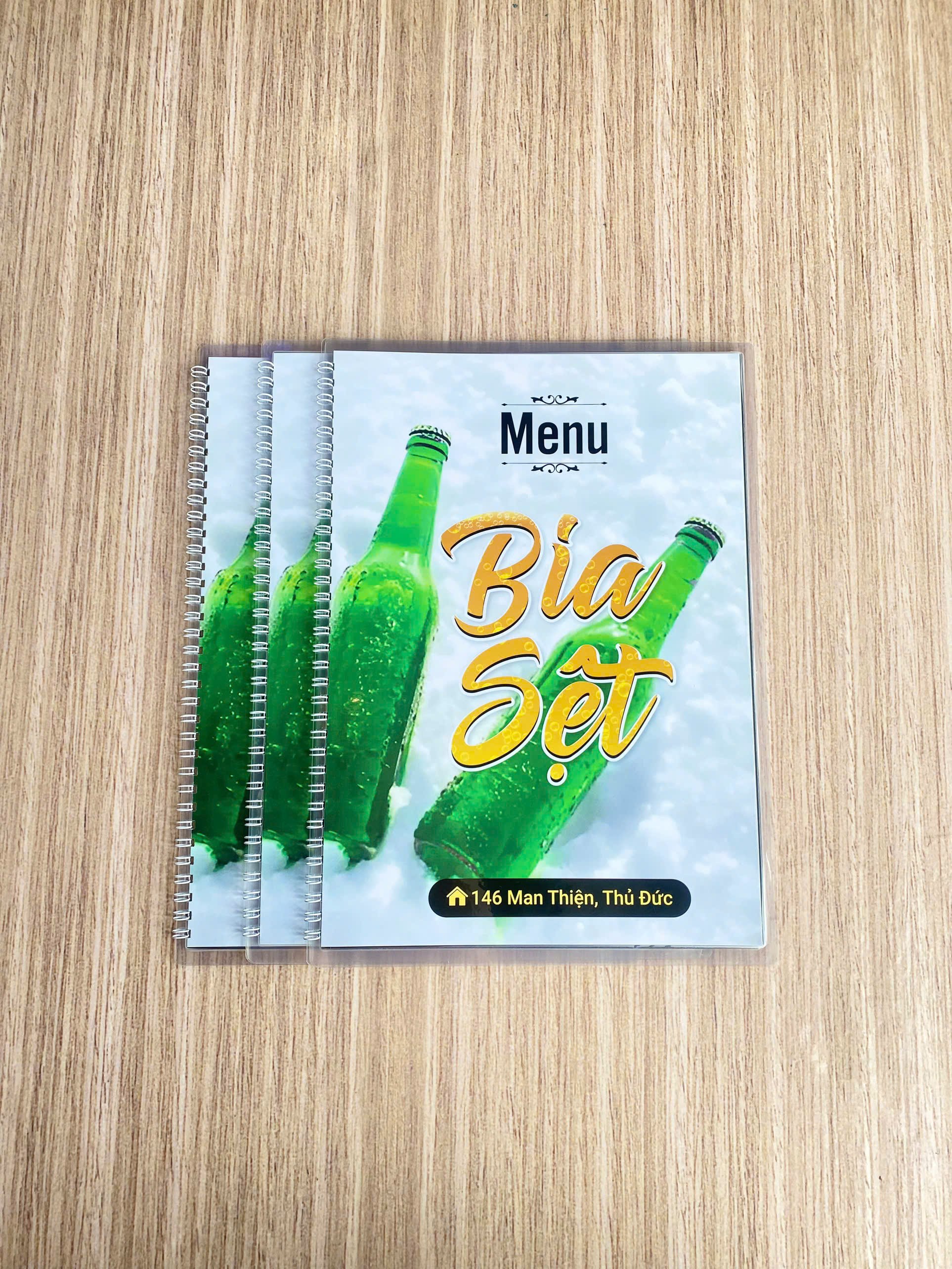 Menu ép plastic đóng lò xo thành cuốn