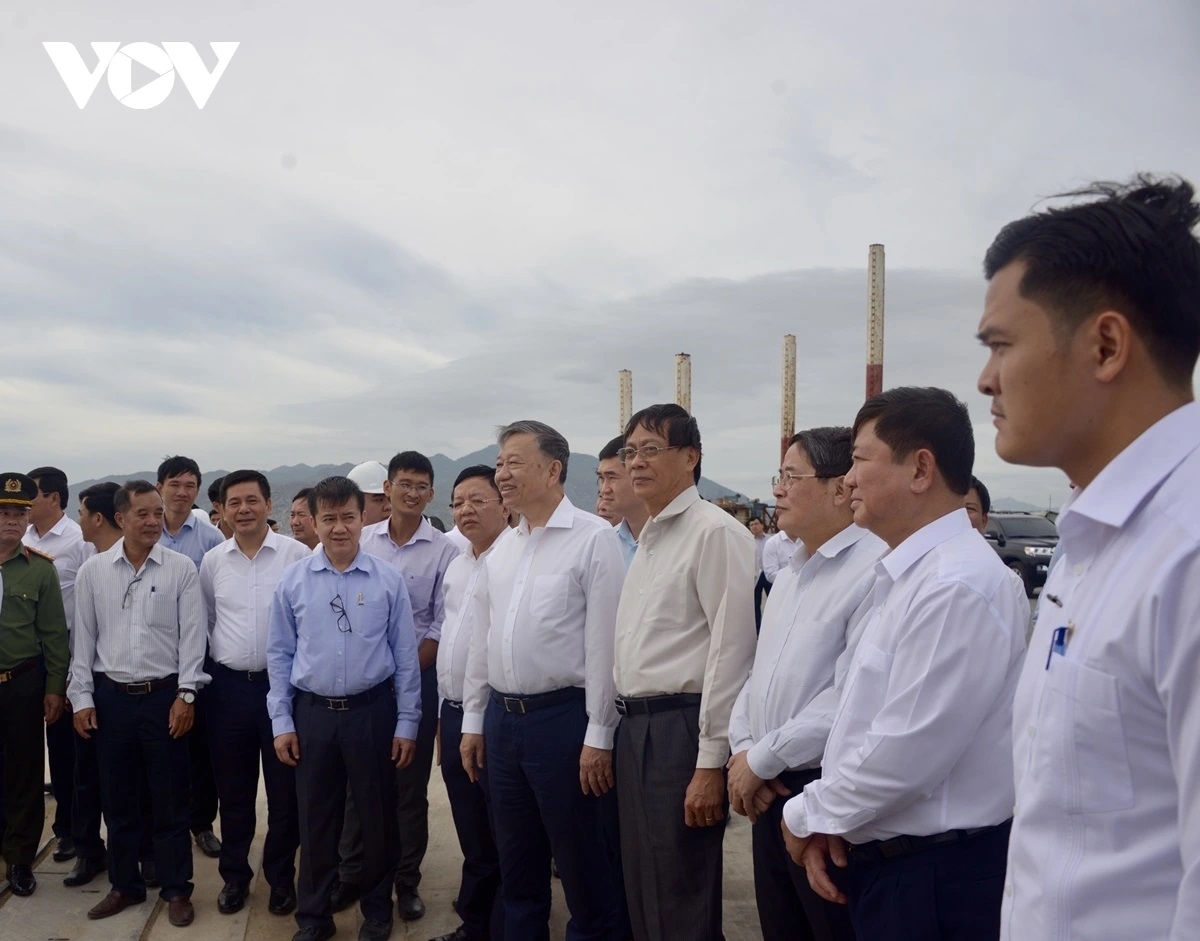 Government officials group photo construction site visit Vietnam