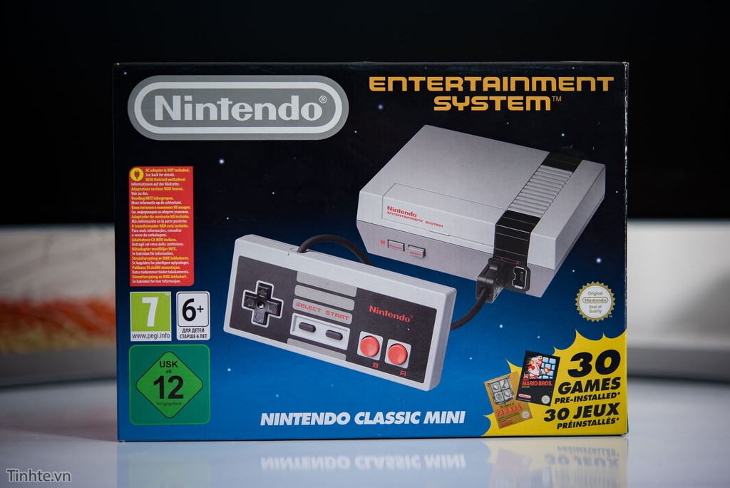 tren-tay-may-choi-game-nes-classic-mini-nho-gon-rat-nhe-tay-bam-to-nhu-hoi-xua