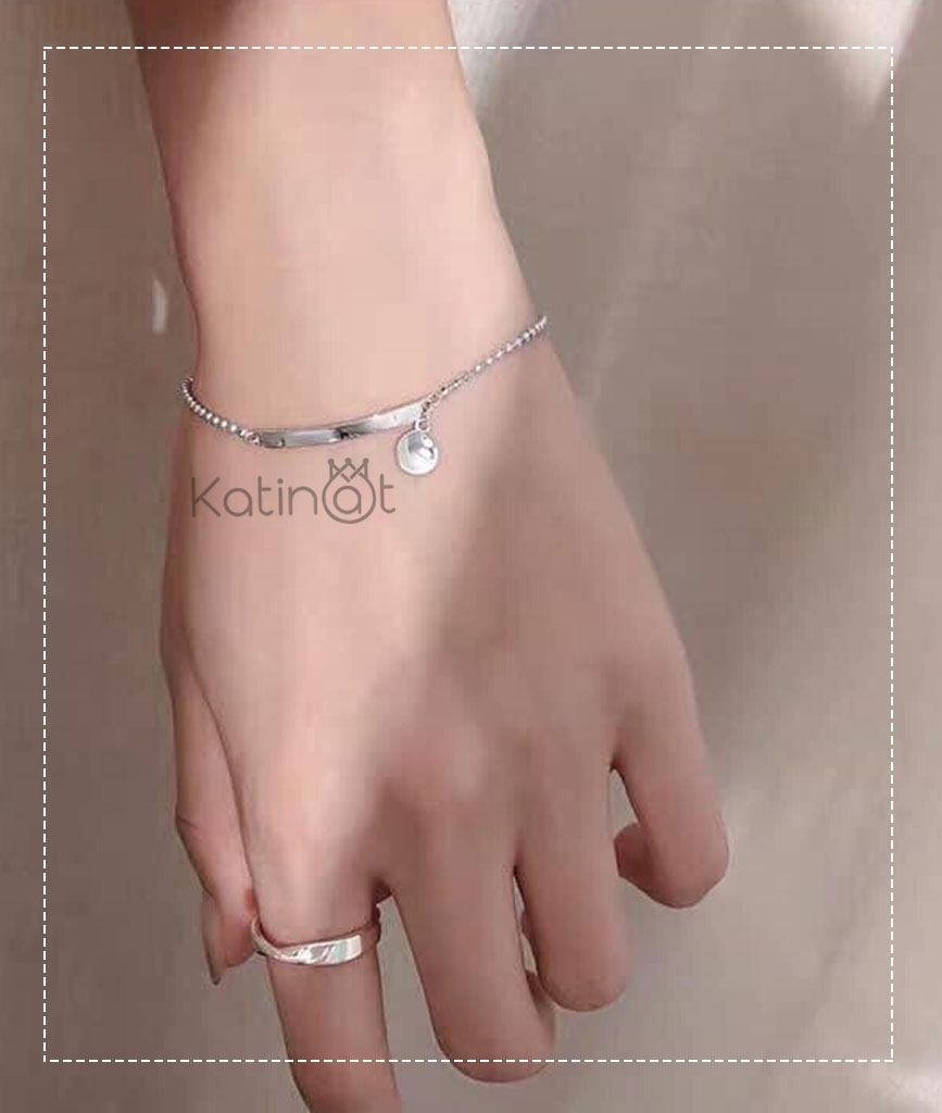 Lắc tay bạc bi tròn có treo hạt may mắn