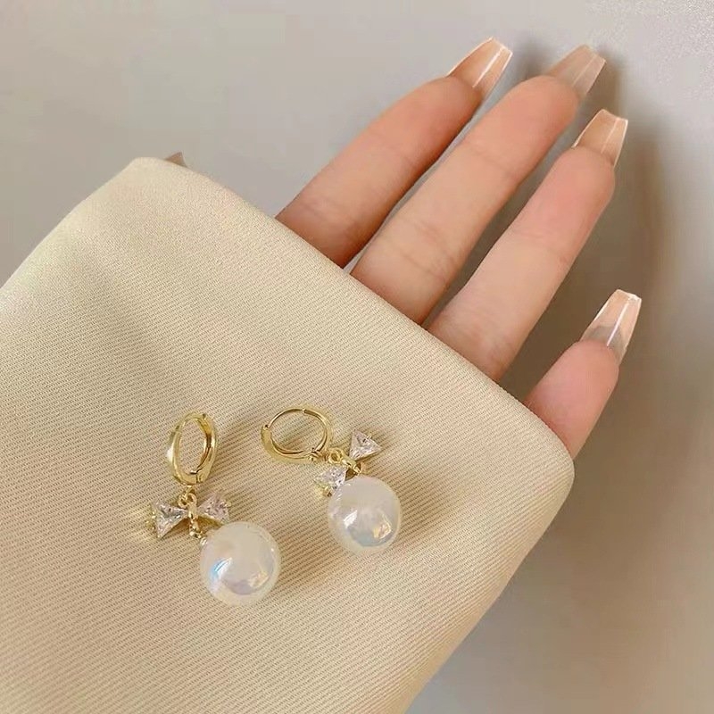 Bông tai ngọc trai  hình nơ đính đá pha lê H99