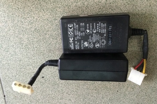 Adapter POWER SUPPLY AKII A25F2-02 MP Dual 12V/5V 1.5A For External Drive Enclosure Connector Size 4Pin Molex IDE