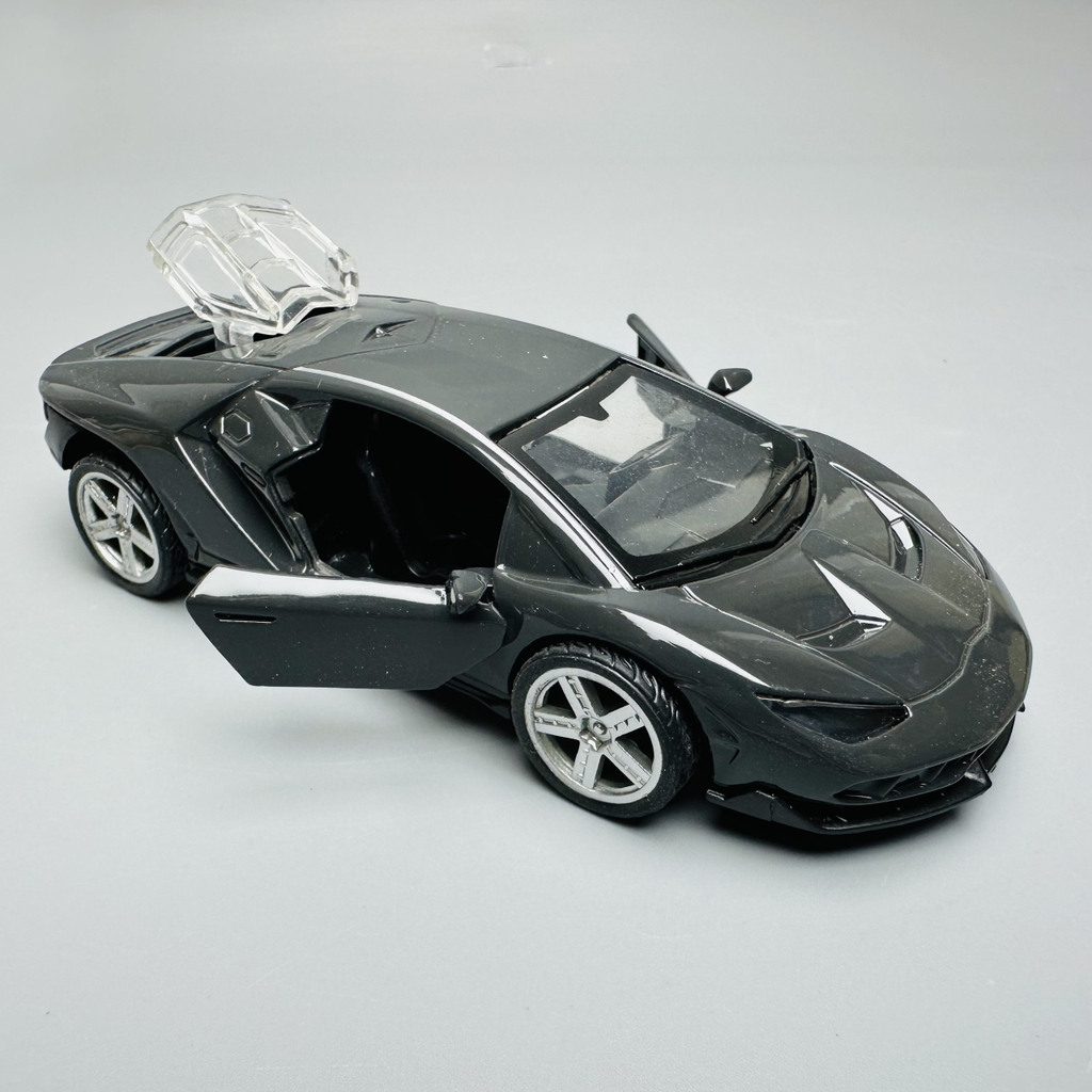 Mô Hình xe lambor đen tỉ lệ 1:36 Hợp kim có thể mở cửa - bánh sau chạy cót - Dài 12cm - rộng 5.5cm - cao 3cm nặng : 200gram - FULL BOX : box màu SKU : oto183 - K63-T1-S9